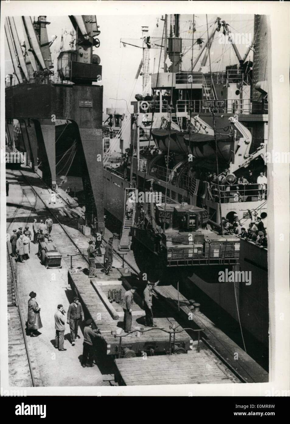 May 05, 1956 - First shipment of arms from America.: The first shipment of heavy arms arrived at Bremerhaven from America, the main items were 23 light tanks seven self-propelled howitzers and 20 tank recovery vehicles. The unloading of the arms took place in the presence of General Heusinger and Ambassador Dowling U.S.A. Photo shows the first shipment being unloaded at Bremerhaven. Stock Photo