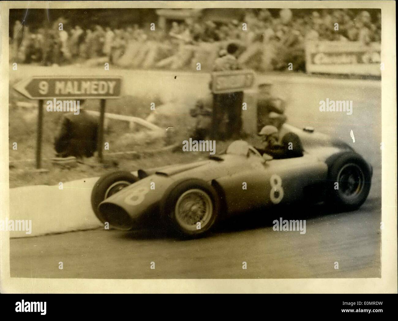 Jun. 04, 1956 - British Driver Wins Belgian Grand Prix.. Average Speed of 118.4 mph... Peter Collins, 24-year-old British driver - in his Ferrari - yesterday won the Belgian Grand Prix at the average speed of 118.4 mph.. Keystone Photo Shows:- Peter Collins at speed in his Ferrari - during the race at Spa, Belgium. Stock Photo