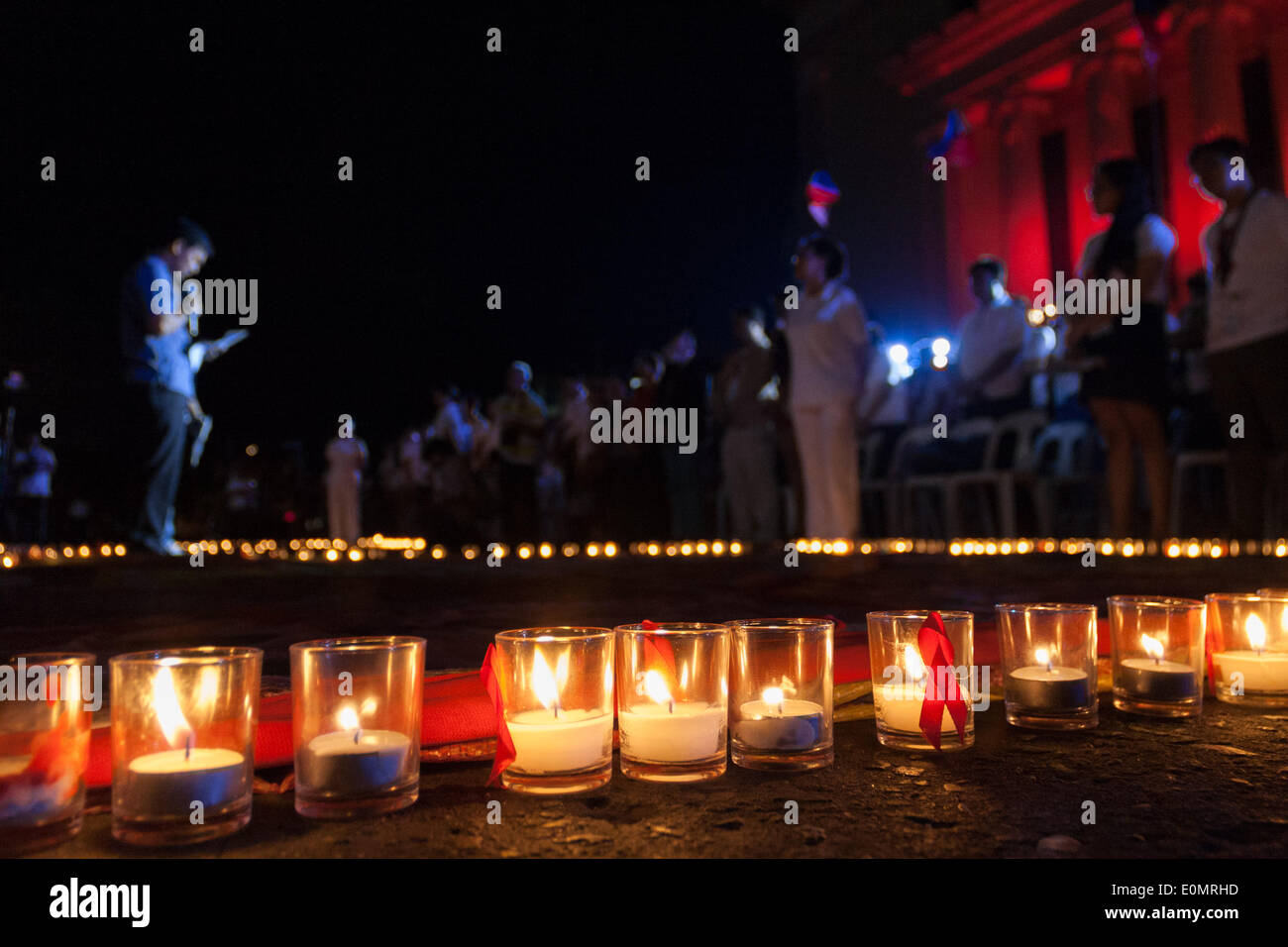 MANILA, PHILIPPINES MAY 16 Delegates pray for the individuals that have perished due to HIV