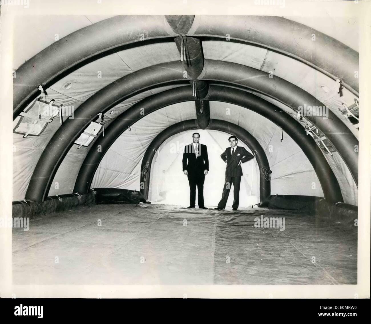 Jun. 06, 1956 - Huff and Puff and You'll Blow Your House Up: Designed by a British firm is an inflatable hut that can be put up Stock Photo