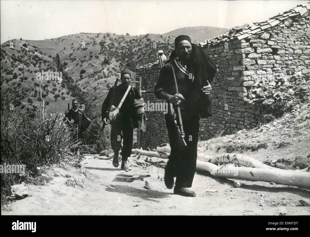 Jun. 06, 1956 - Natives Co-Operate in war against rebels: Loyal Algerian natives are helping French troops in their warfare against rebels in the Souman Area. Photo shows natives armed with rifles on a patrol mission. Stock Photo