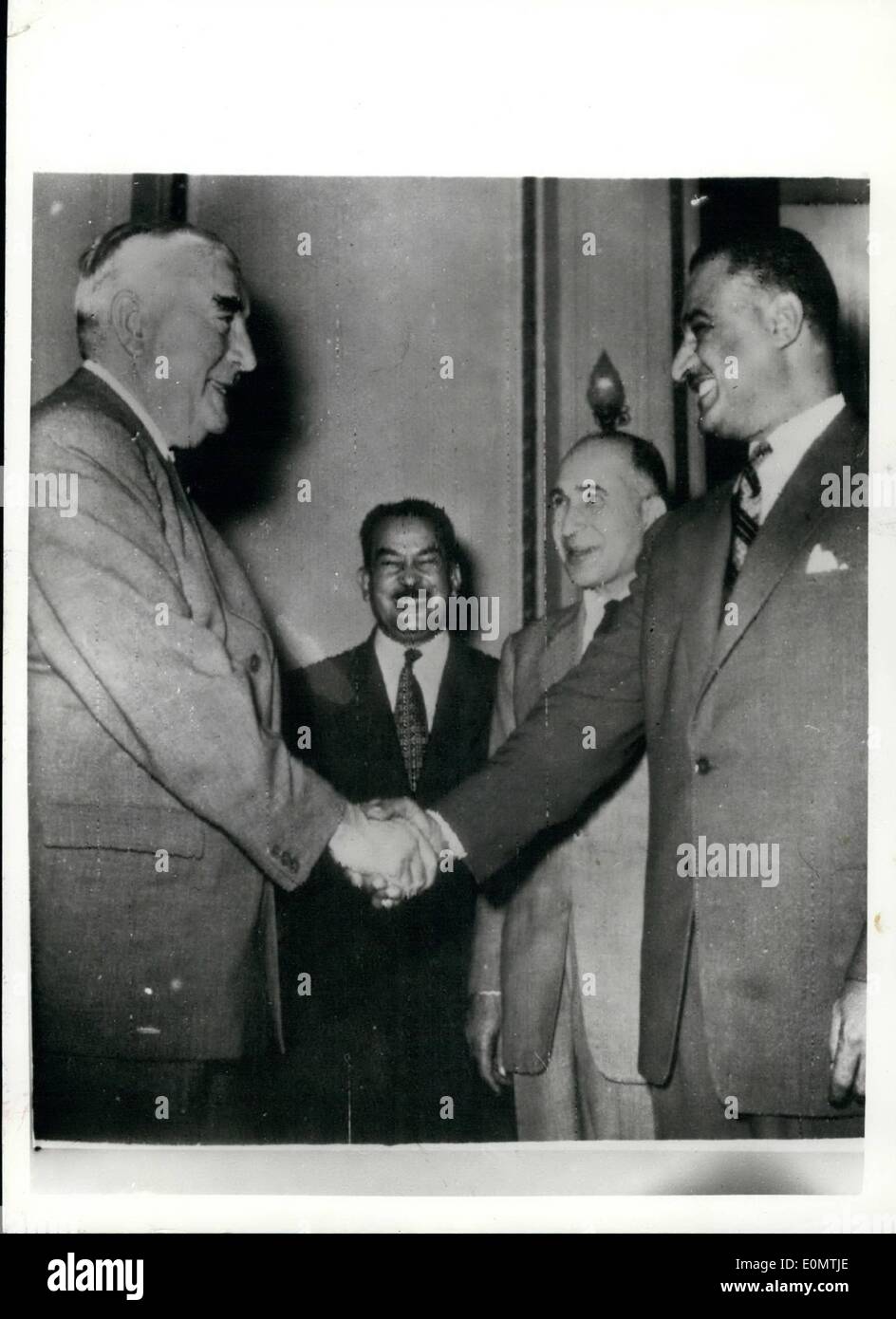 Sep. 03, 1956 - 3.9.56 Mr. Menzies meets President Nasser at Cairo. Mr. Menzies and the four members of his Suez Committee had their first meeting with President Nasser in Cairo today. Photo Shows: Mr. Menzies (left) shakes hands with Colonel Nasser at the opening of the Suez talks in Cairo today. Between them is Wing Commander Aly Sabry (left) and the Egyptian Foreign Minister, Mahmoud Fawzy Stock Photo