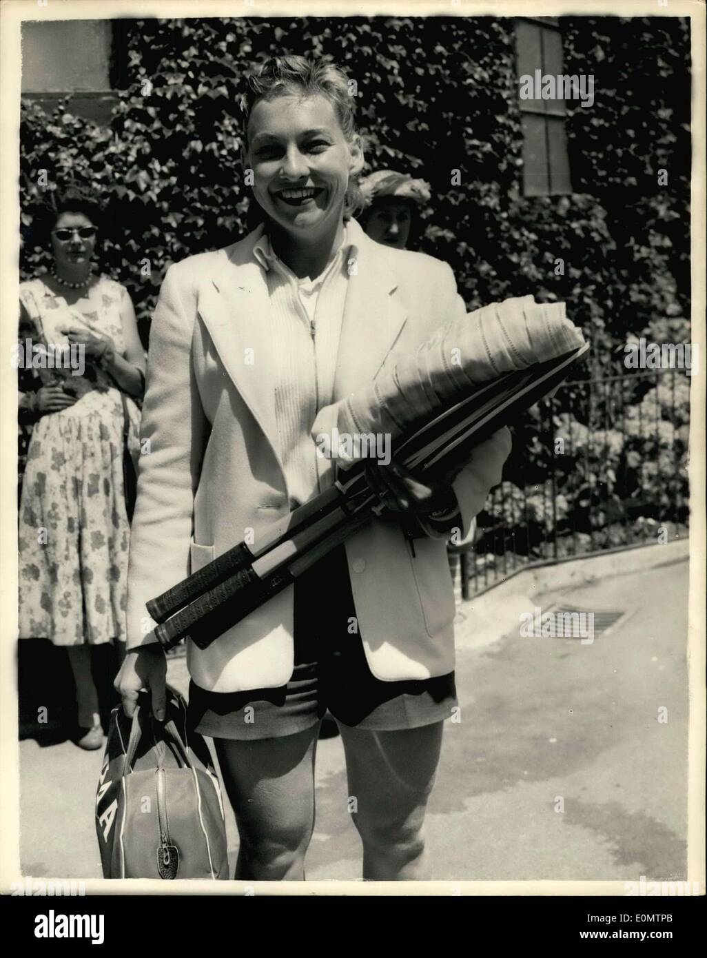 Jun. 26, 1956 - Wimbeldon - second day. Photo shows The American player, Darlene Hard, arrives at Wimbledon today wearing a white blazer and blue shorts. Stock Photo