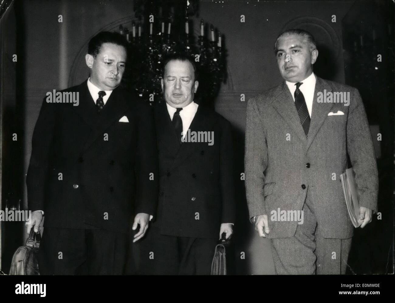 Sep. 09, 1956 - Reservists to be demobbed; Problem discussed at cabinet meeting: The problem of the demobilization of reservists is being discussed at a cabinet meeting at the Elysee Palace today. From left to right: M. Bourges Maunoury, Minister of National Defense, Lacoste, Minister residing in Algeria, and Laforest, Air secretary leaving the Elysee. Stock Photo