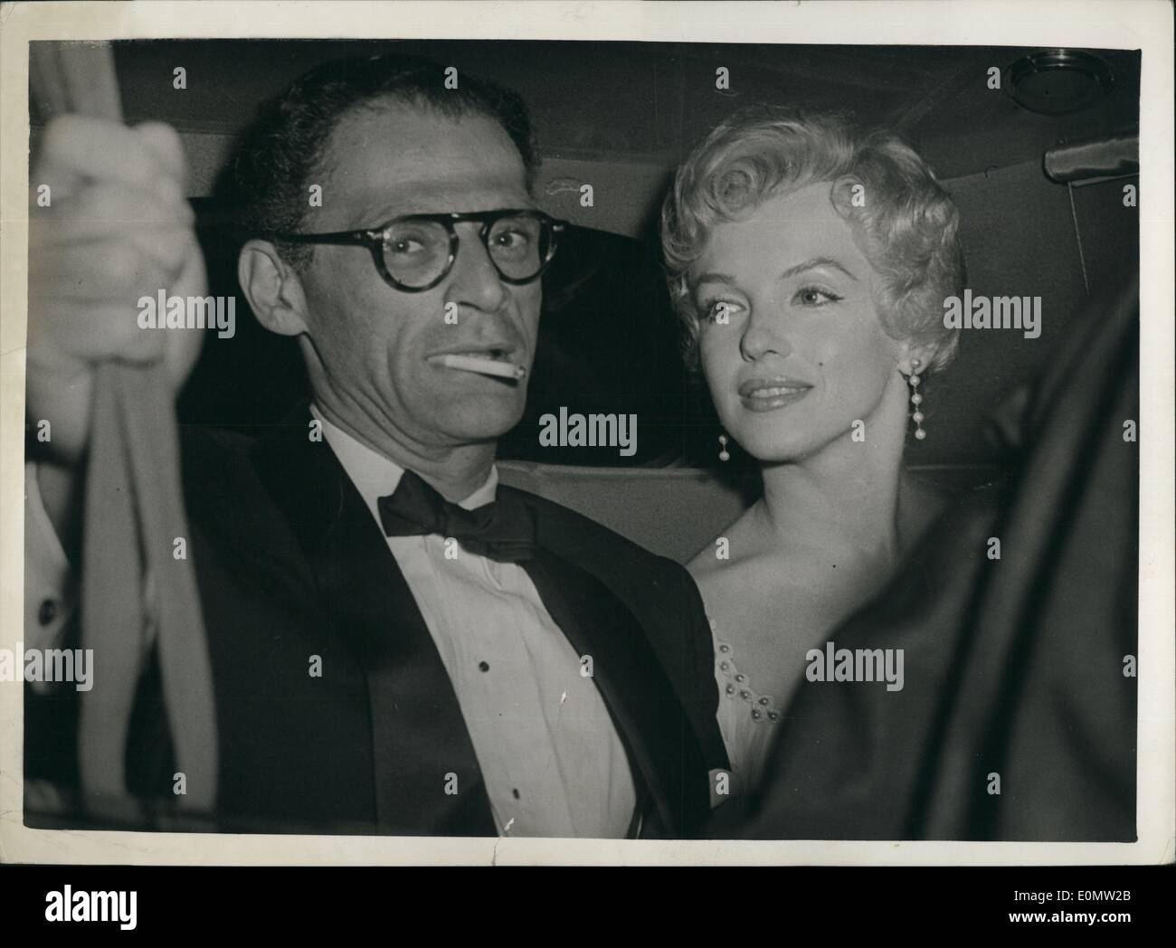 Jul. 07, 1956 - Marilyn Monroe At Party. Photo shows Marilyn Monroe and her husband, Arthur Miller, seen last night when they arrived at the Sunningdale, Berkshire, home of playwright Terence Rattigan, for a small private party. Stock Photo