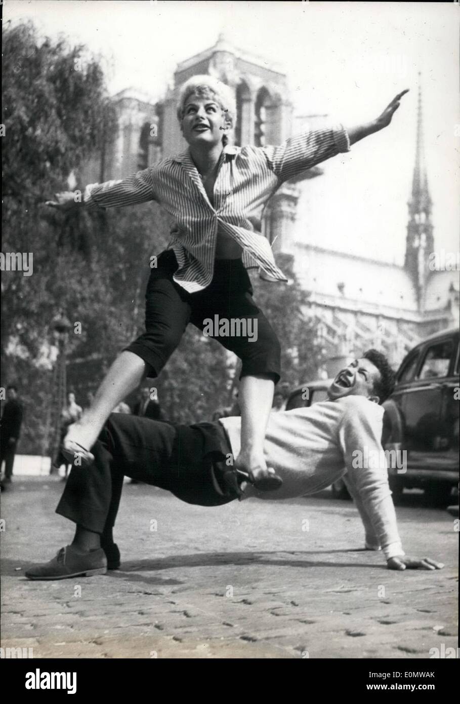 Sep. 09, 1956 - Rock 'N' Roll Crosses Channel: The rock and roll frenzy after sweeping London is now threatening to spread to Paris. Henri Salvador, the crooner, and Mimi Grilli, a cabaret dancer, give a convincing demonstration of rock'n'roll in Paris today. Stock Photo
