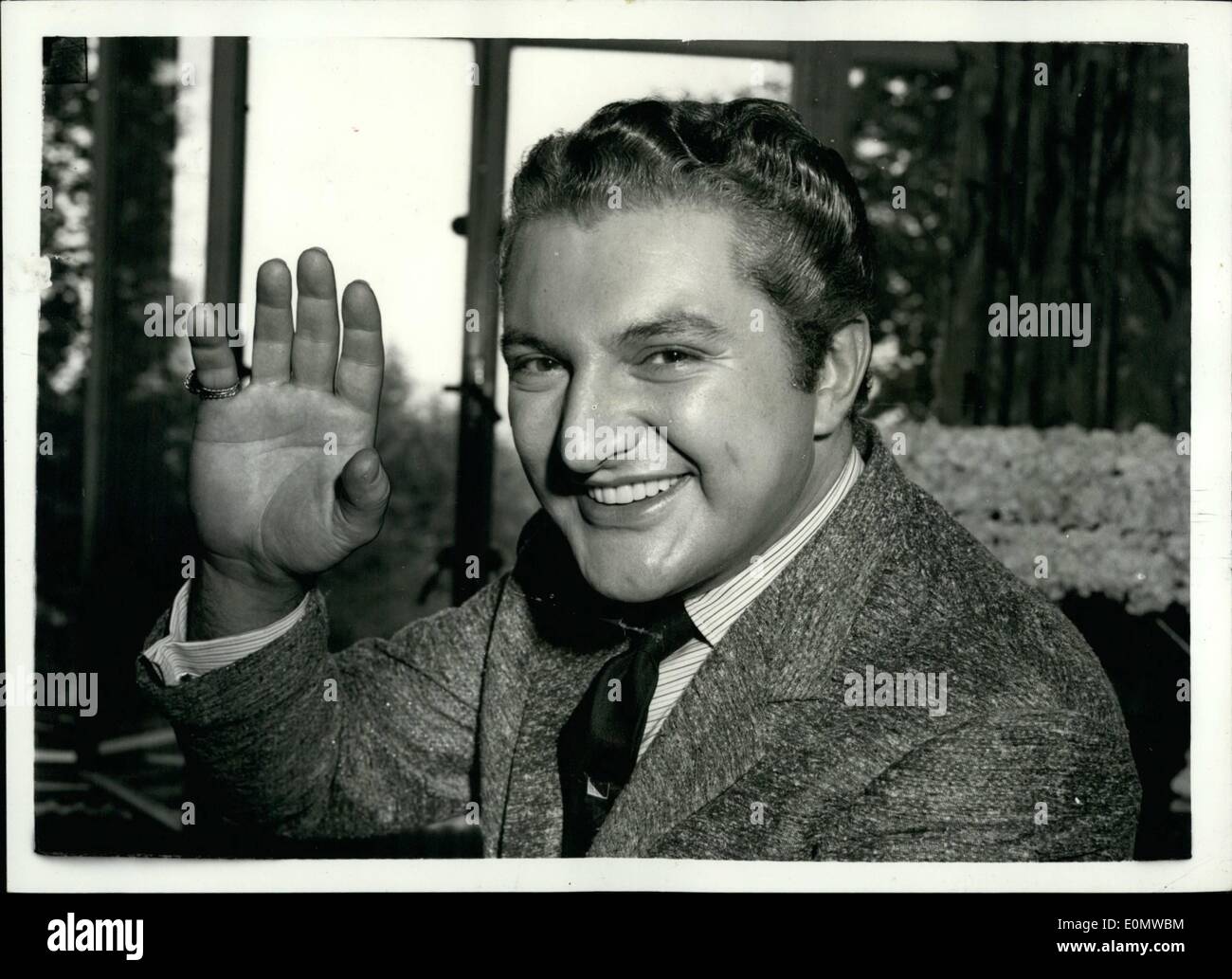 Sep. 09, 1956 - Liberace Arrives In London. Photo shows Liberace, the famous pianist, who was given a great reception when he arrived in London today - gives his famous smile for the cameraman at the Savoy Hotel today. Stock Photo