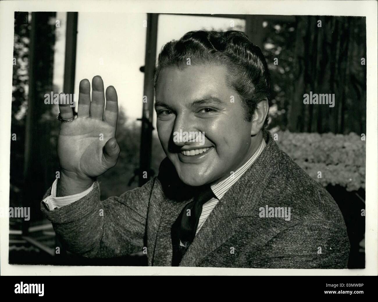 Sep. 09, 1956 - Liberace Arrives In London. Photo shows Liberace, the famous pianist, who was given a great reception when he arrived in London today - gives his famous smile for the cameraman at the Savoy Hotel today. Stock Photo