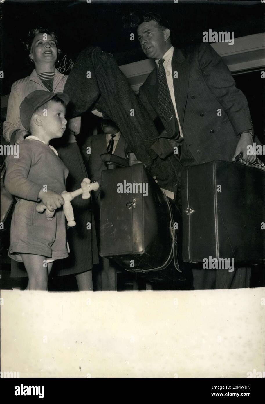 Sep. 18, 1956 - Tonight, the first contingent of foreign pilots arrived from Cairo. Here is Norway's Paglin Samerud with is wife and son. Stock Photo