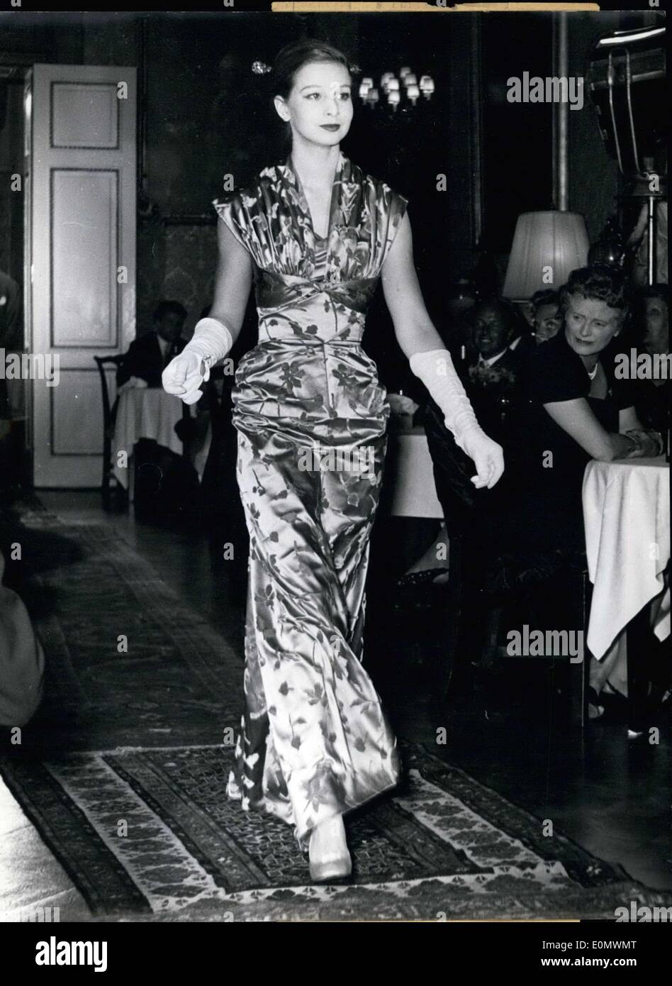 Sep. 27, 1956 - Famed fashion designer Heinz Schulze-Varell showed several pieces from his collection for fall/winter 1956/57 at the Schlosshotel Kronberg. Pictured is the evening dress ''Alle Herrlichkeit. Stock Photo