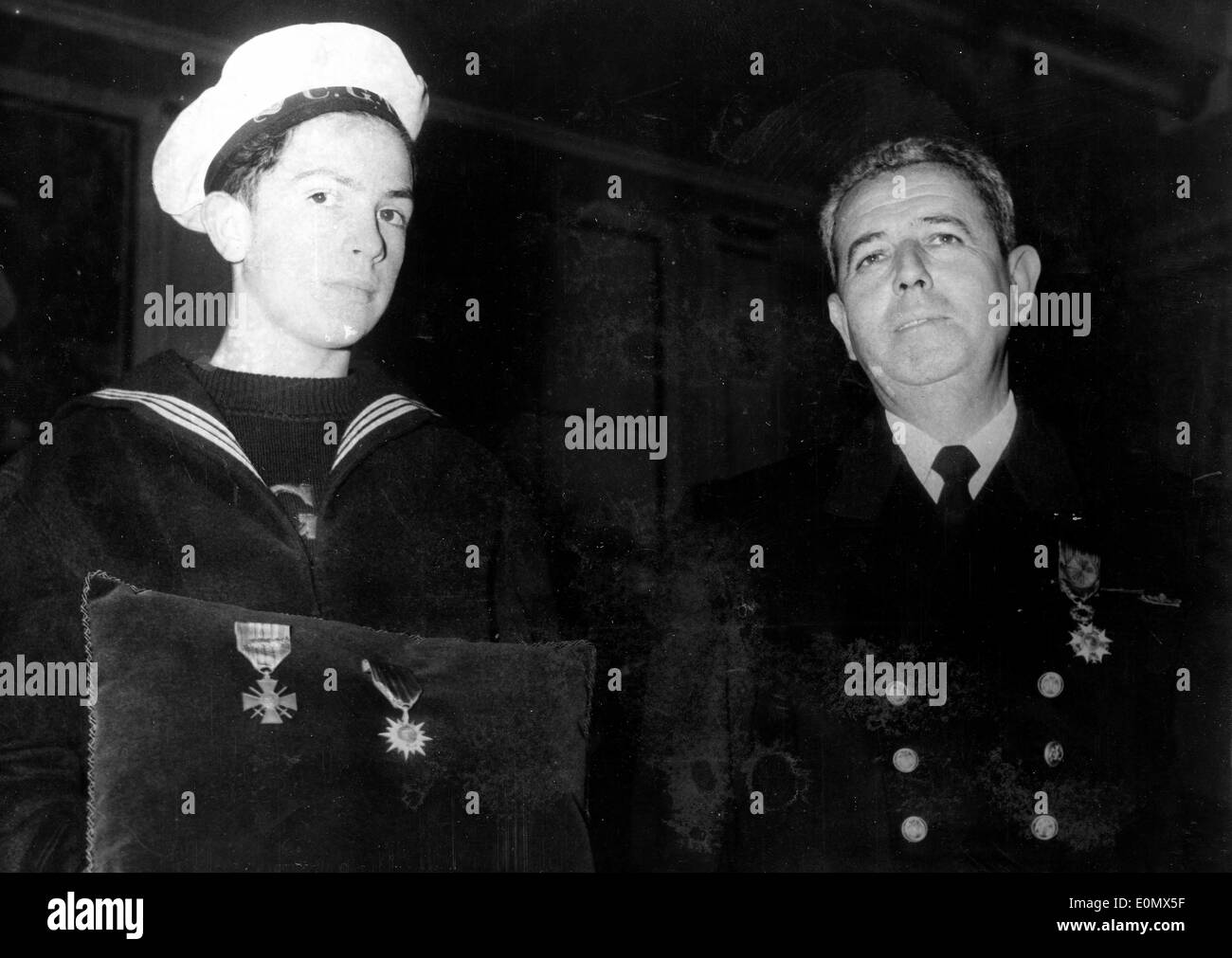 Aug 02, 1956; Paris, France; Dr. Le Ct. De BEAUDEAN and shipboy GUILLOU. Stock Photo