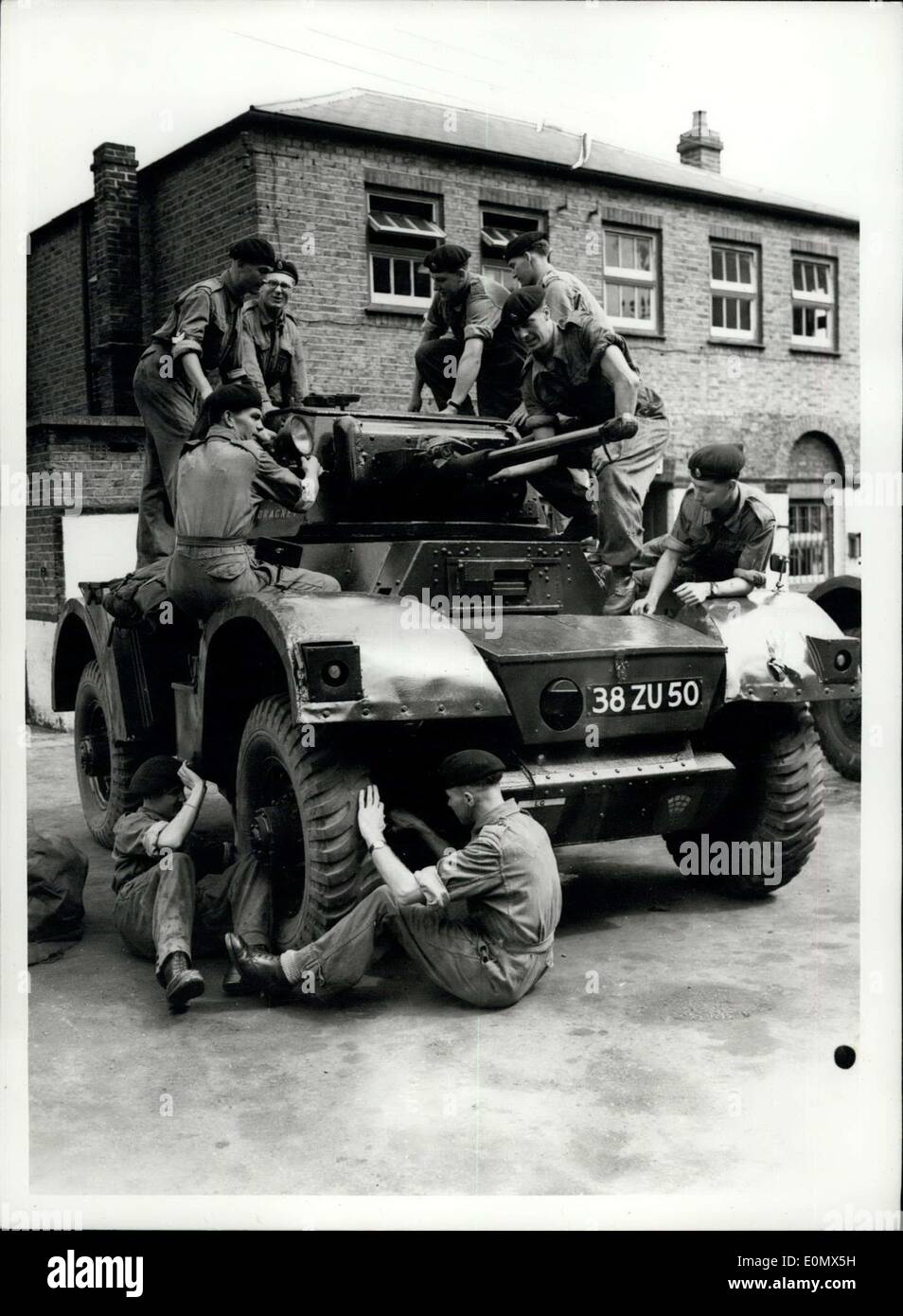Aug. 03, 1956 - Operation Suez begins - life guards get orders to pack overseas: Among the Army units involved in the Suez Canal emergency are the Life Guards at Windsor, who have been ordered to pack for overseas duty. Many of them have been recalled form leave. Photo shows the scene as men of the Life Guards prepare an armoured vehicle at Windsor Barracks this morning (Combernere Barracks, Windsor) Stock Photo