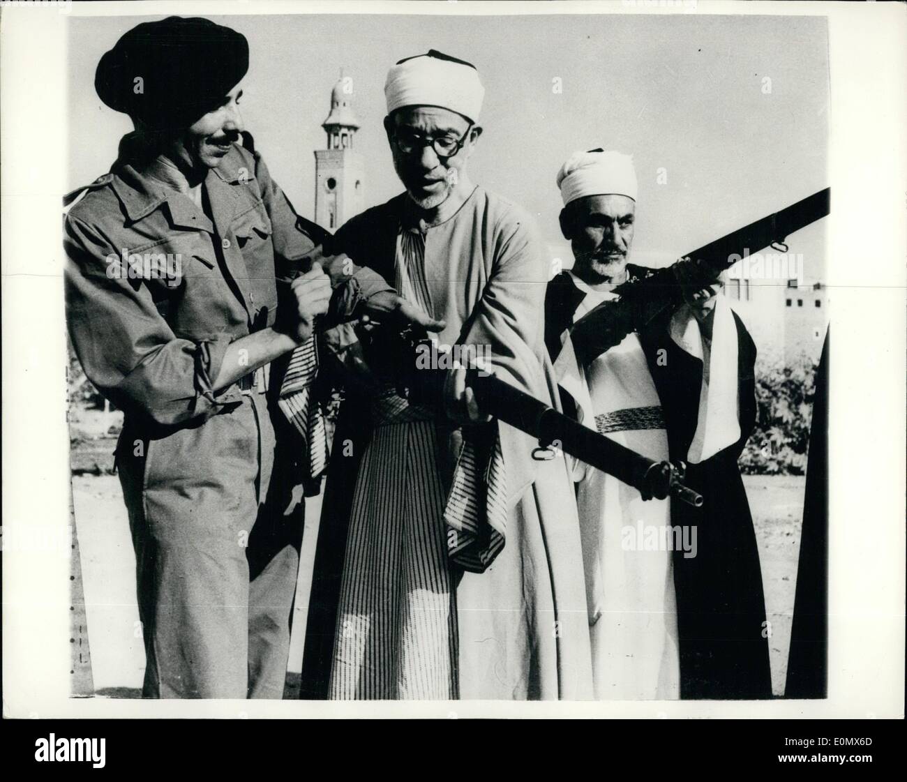 Aug. 08, 1956 - Military Training at Al Azhar university in Egypt. Military training has begun at the Al Azhar University in Egypt - and here is Sheikh Abdel Rahman Tag, Rector of the Azhar University, receiving instruction in the use of a rifle, from one of the officers in charge. Stock Photo
