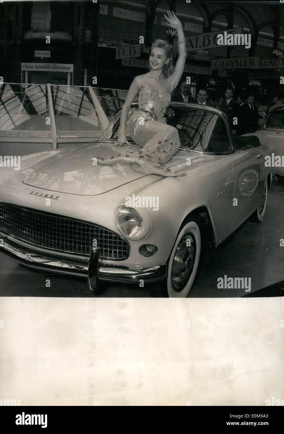 Oct. 10, 1956 - Paris Motor Show Opens: The motor show 1956 opened at the Grand Palais, Paris, this morning. Photo Shows The Simca ''Oceanic Line'' advertise their new car in an unusual manner: A ''Mermaid'' seated on the Bonnet of the car. Stock Photo