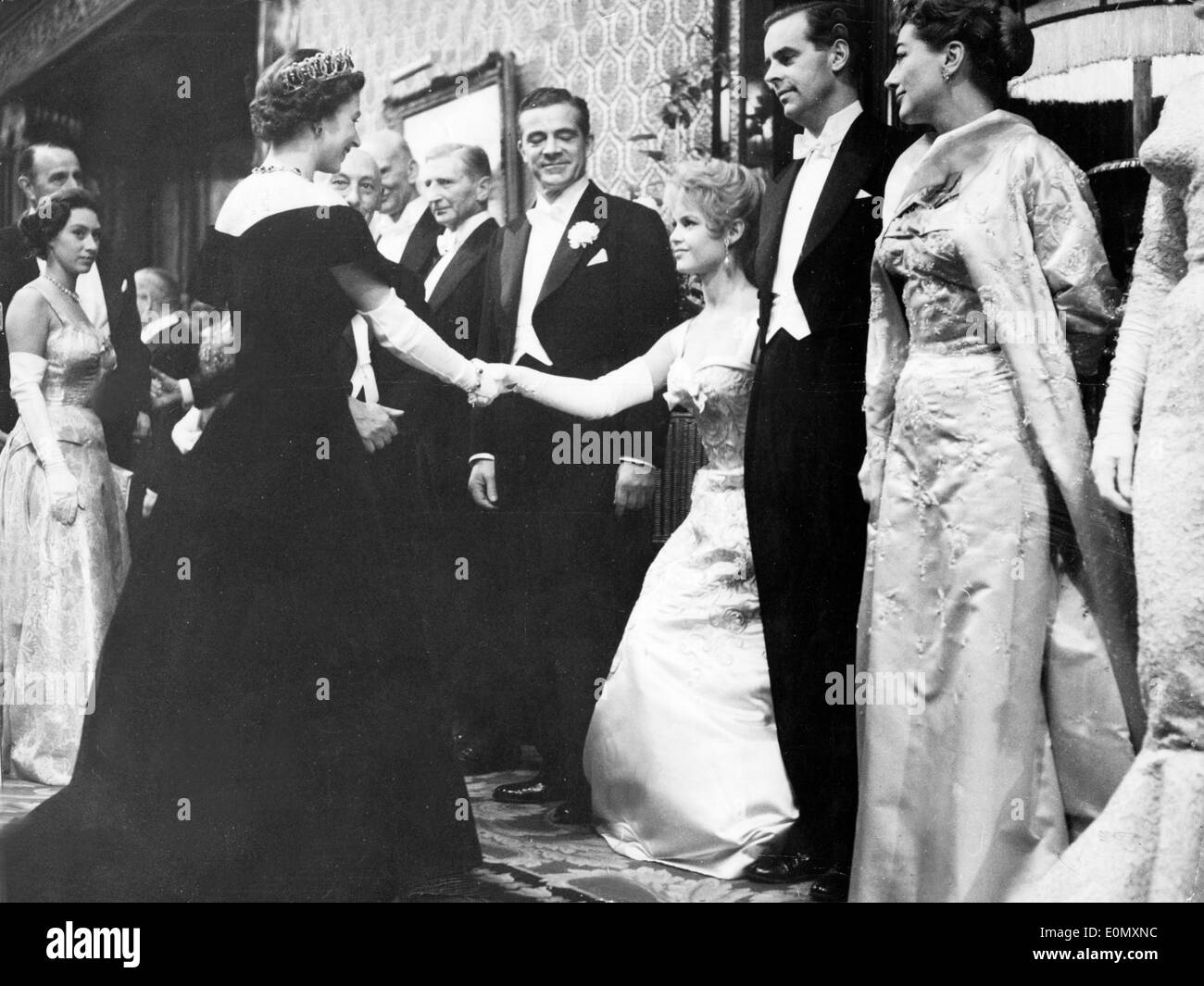 Actress Brigitte Bardot greeting Queen Elizabeth II during a 'Royal Film Performance' Stock Photo