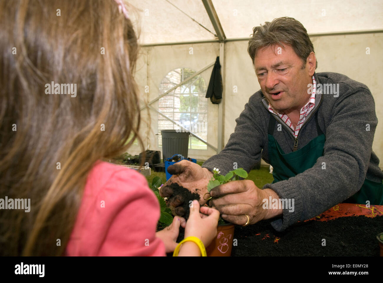 Celebrity gardener Alan Titchmarsh with green fingers at a Grow For It event, Royal School, Hindhead, Surrey, UK. Stock Photo