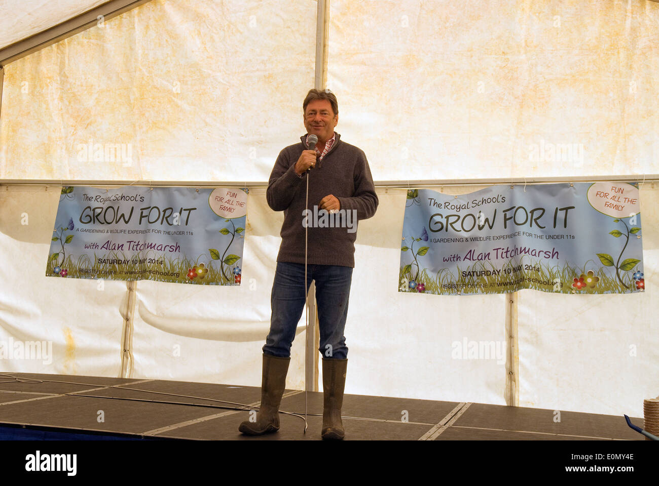 Celebrity gardener Alan Titchmarsh speaking to attendees at a Grow For It event, a day of outdoor activities and gardening tasks, Hindhead, Surrey, UK Stock Photo