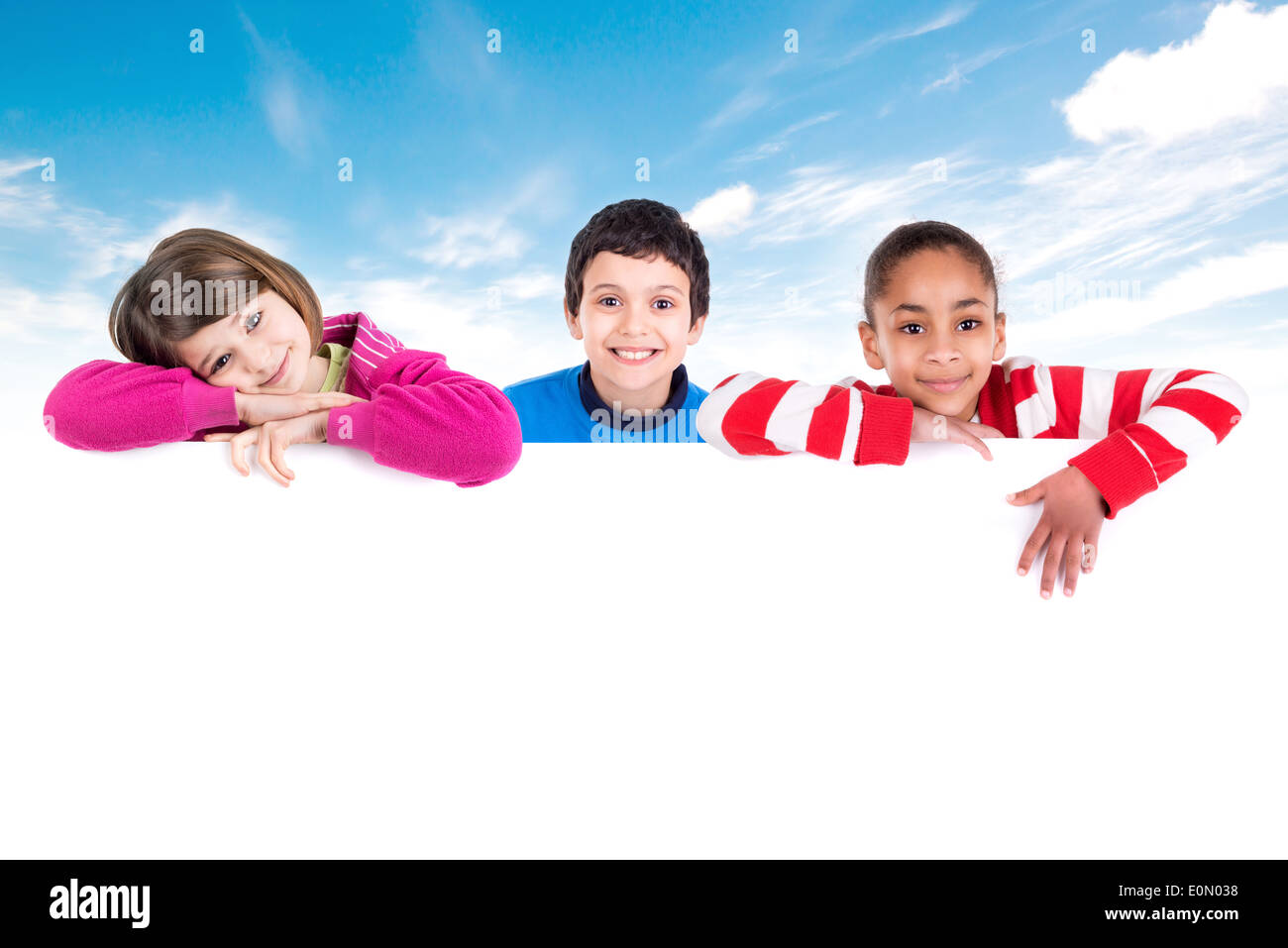 Group of children with a white board Stock Photo