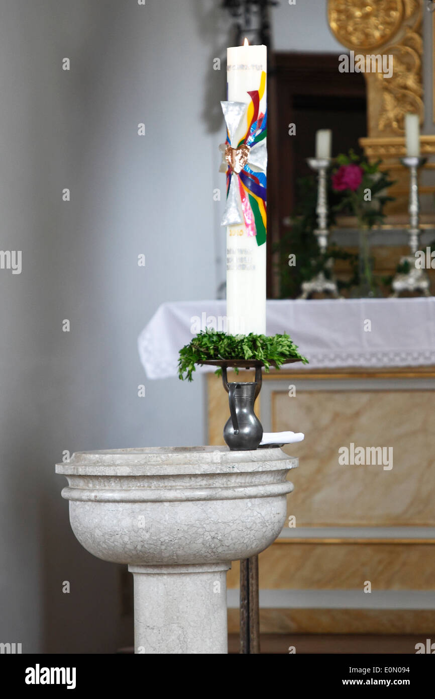 Font with easter candle in church Stock Photo