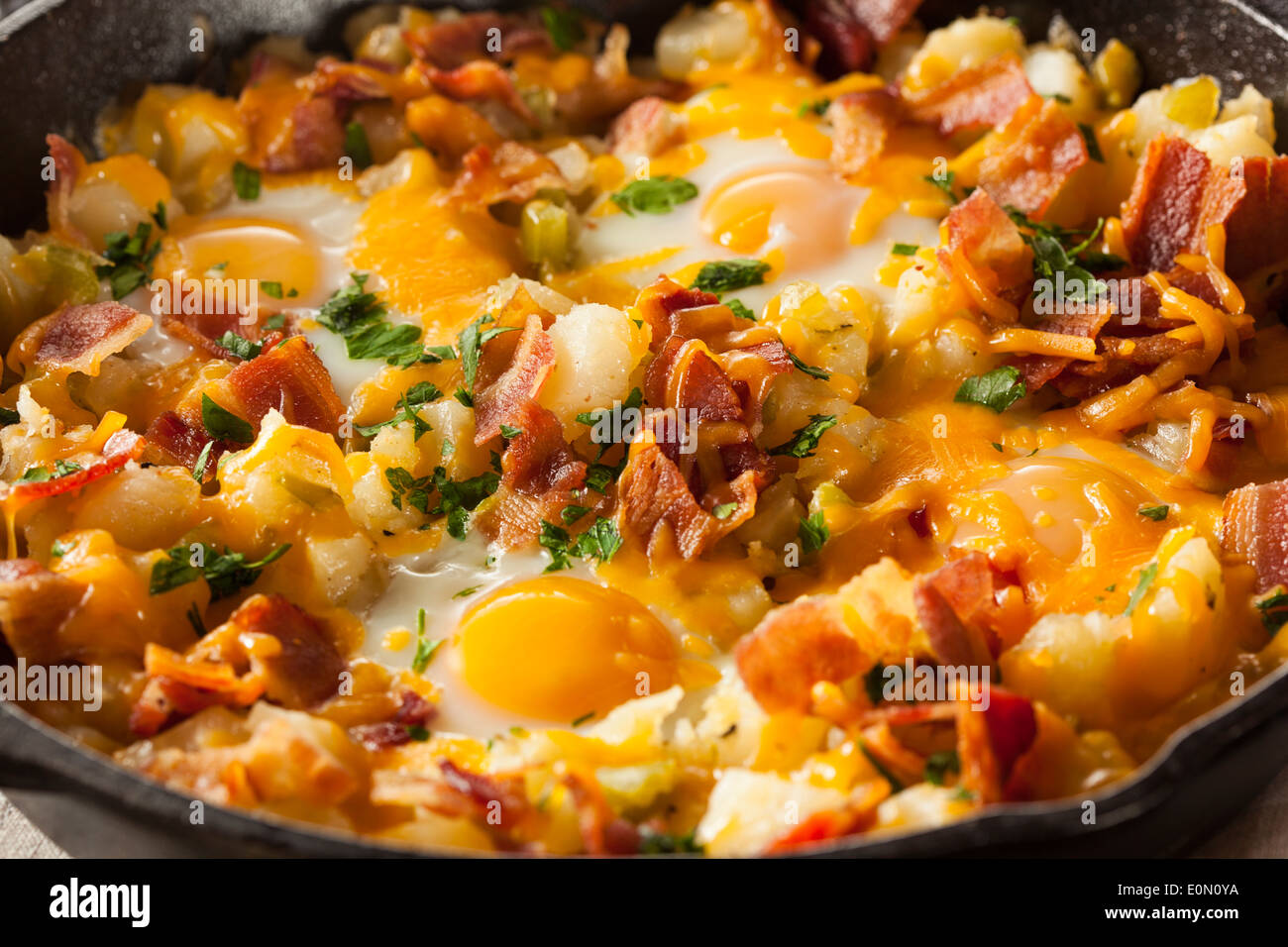 Homemade Hearty Breakfast Skillet with Eggs Potatoes and Bacon Stock Photo Alamy