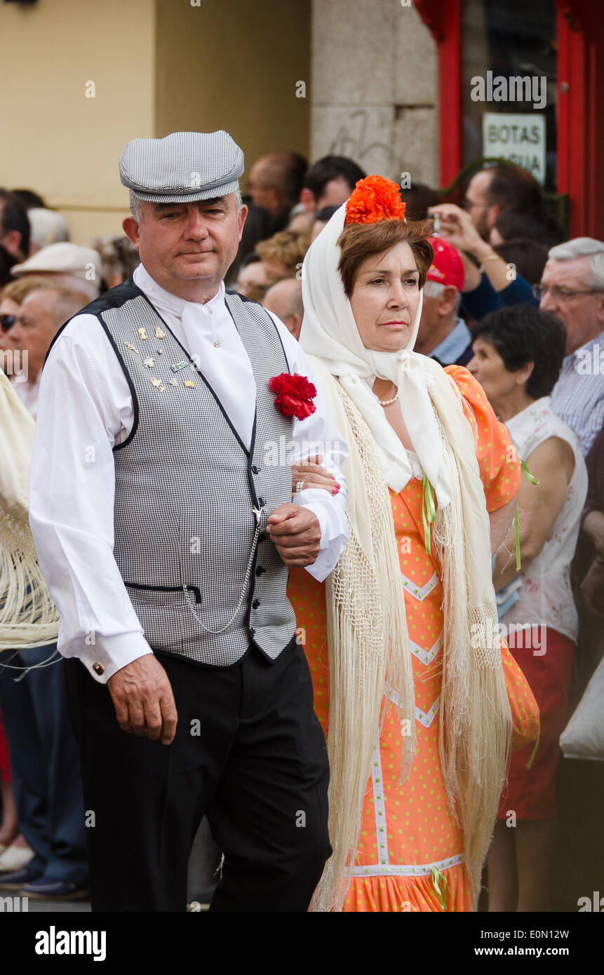 Madrid, Spain. 15th May, 2014. Fiesta de San Isidro, Madrid Credit:  Jennifer Booher/Alamy Live News. A couple dressed in traditional chulapo costumes. Stock Photo