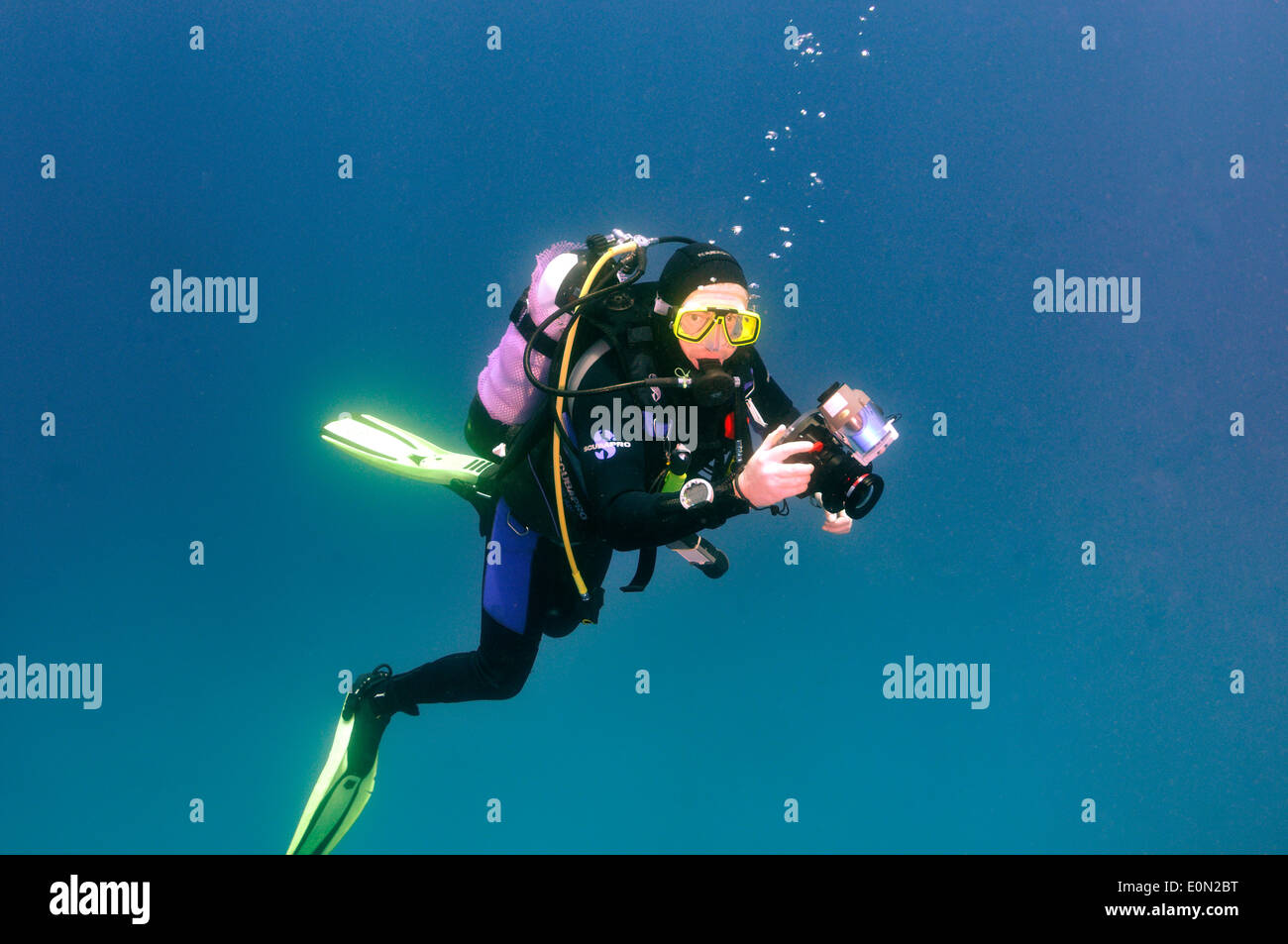 Scuba diver with camera Stock Photo