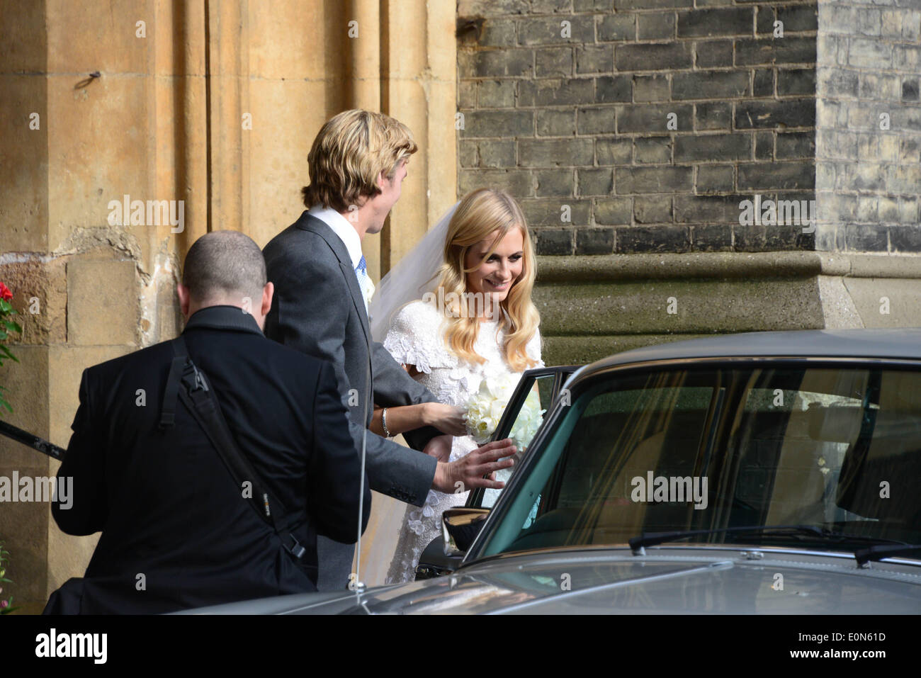London, UK. 16th May, 2014. Poppy Delevingne and James Cook leaving St Paul's Church at  Knightsbridge after wedding ceremony in London. Photo by See Li/Alamy Live News Stock Photo