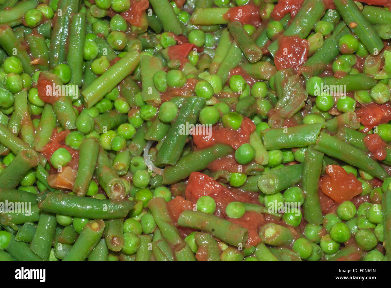 healthy eating peas and tomatoes Stock Photo Alamy
