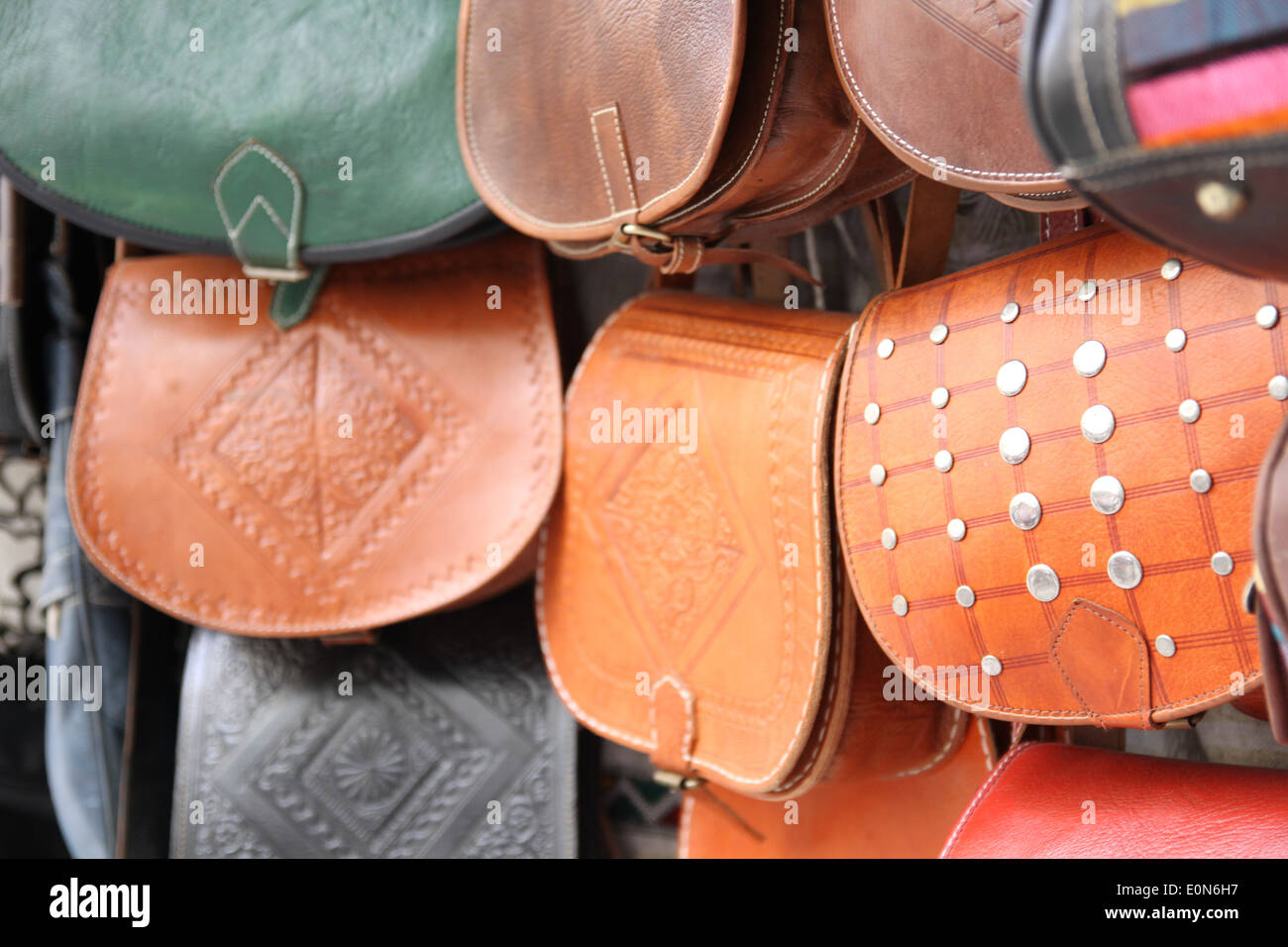 leather handbags for sale in a shop in Morocco Stock Photo