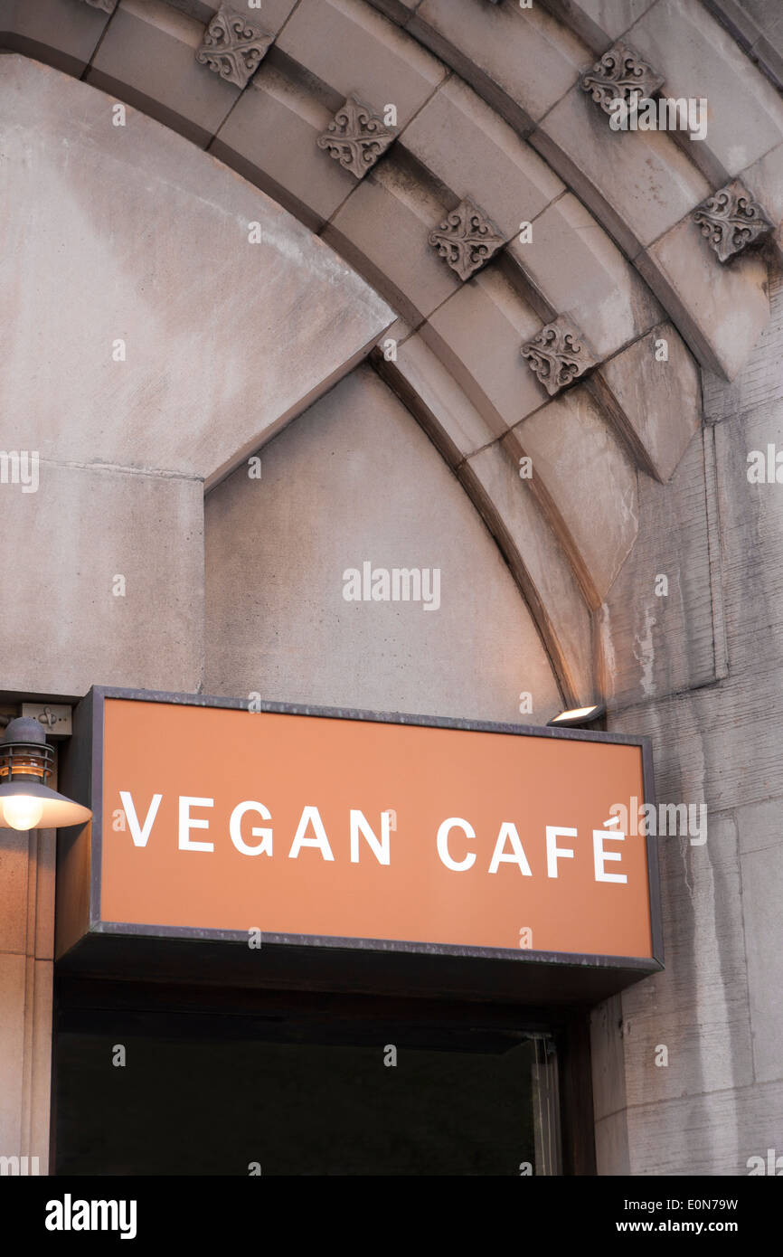 Restaurant sign for a vegan cafe. Stock Photo