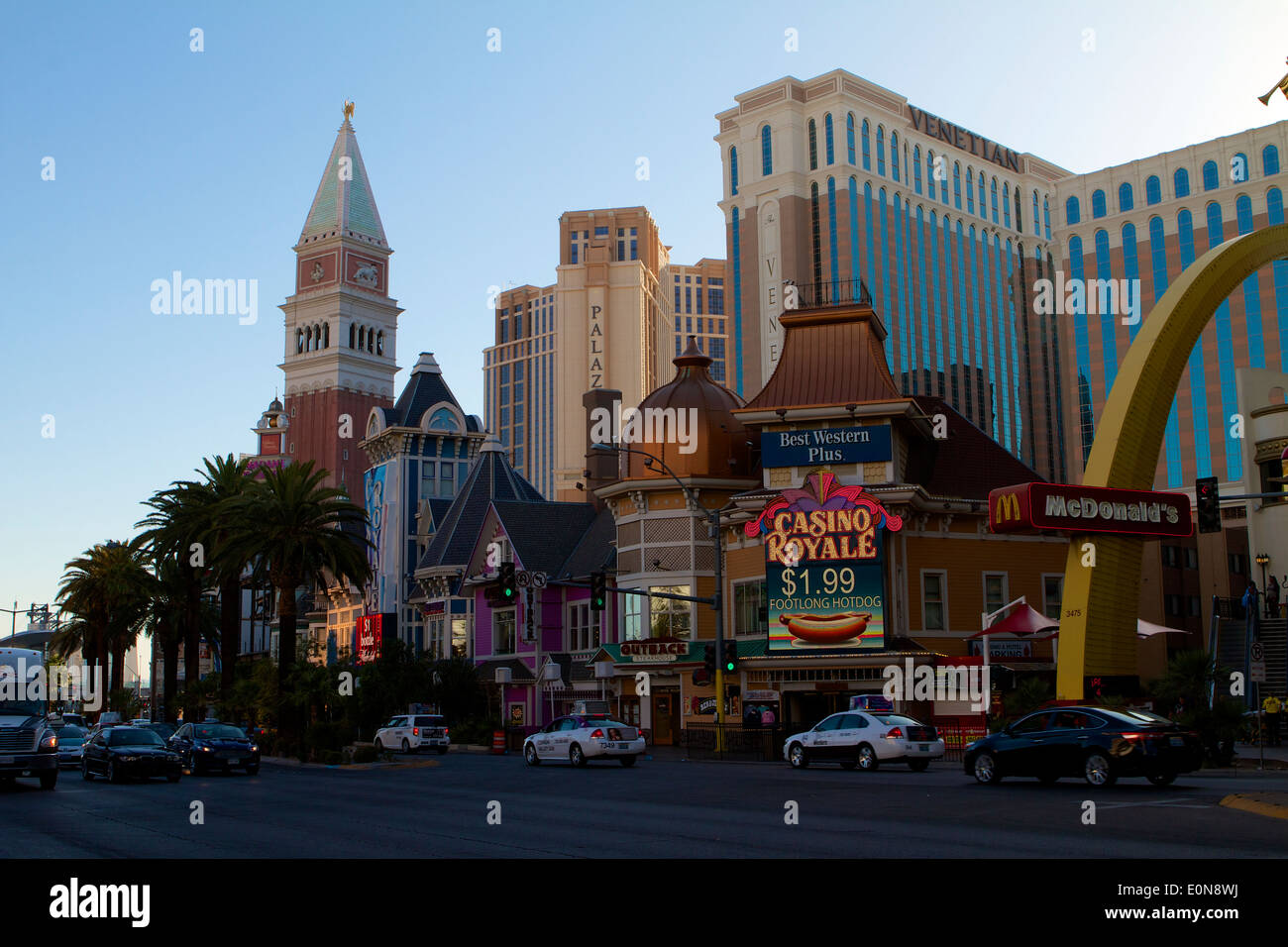 Street view of the Casino Royale and theVenetian hotel at dusk on the Las Vegas strip Nevada Stock Photo
