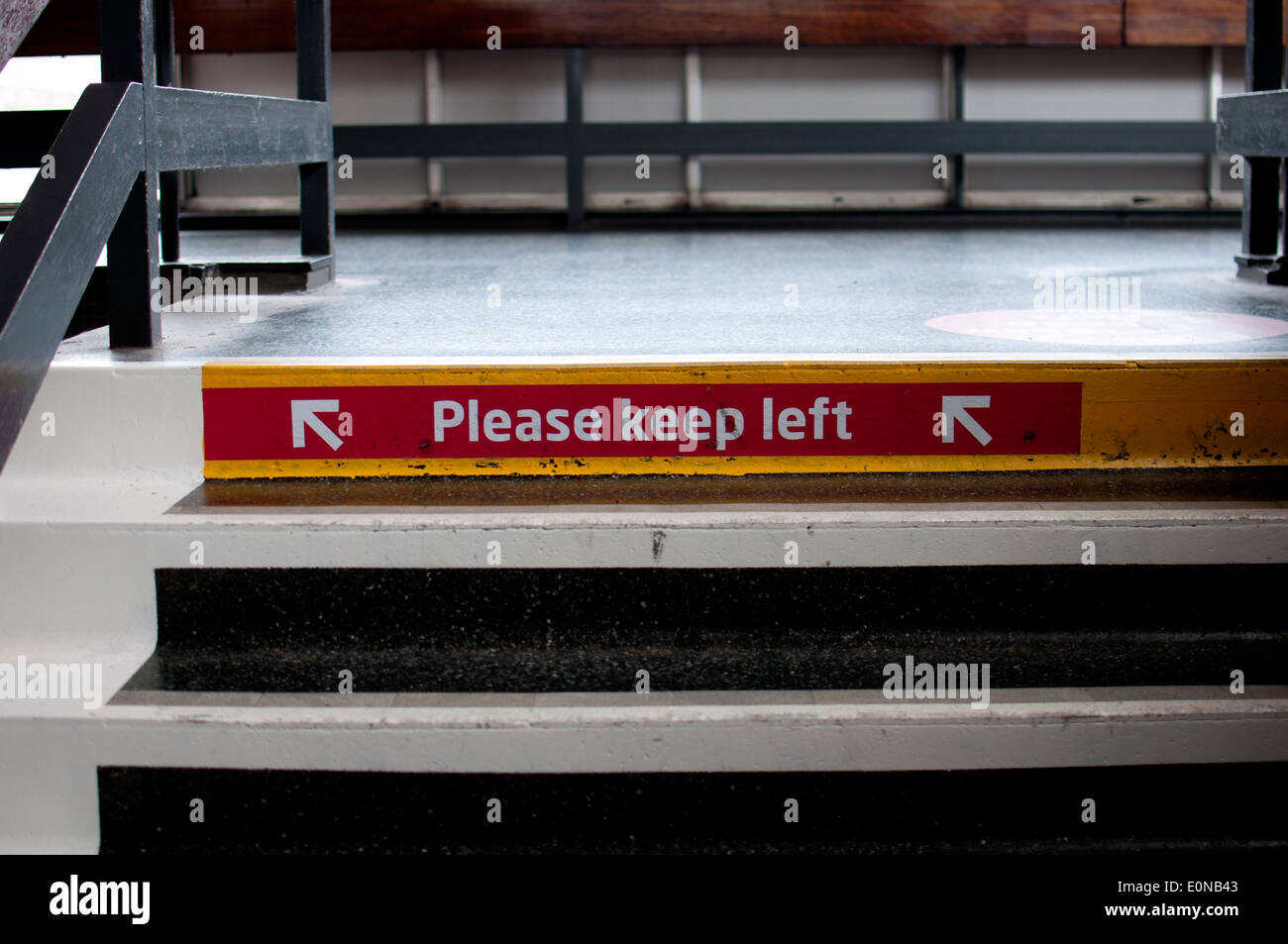 Please keep left sign on stairs at Coventry railway station, UK Stock Photo