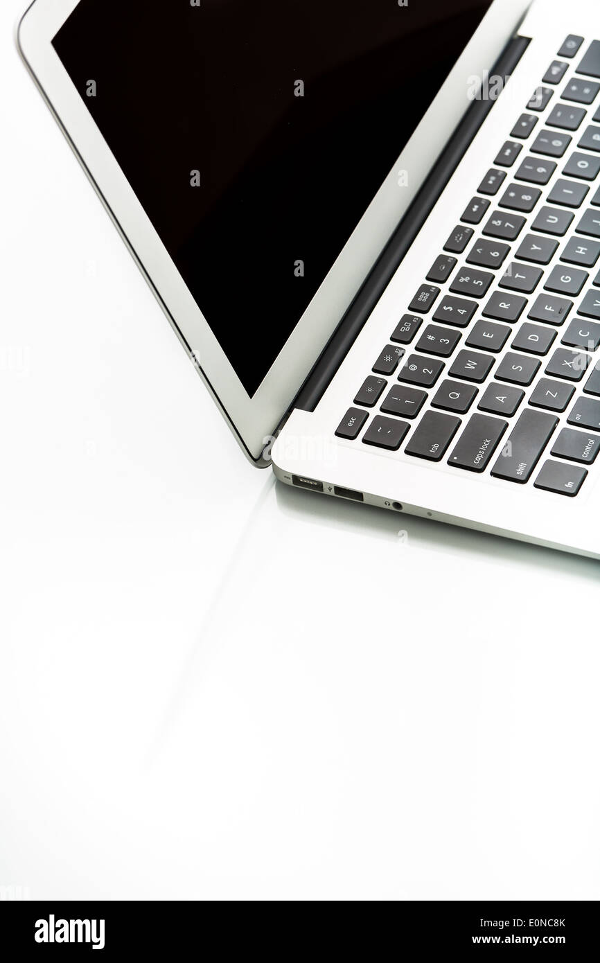 Modern laptop computer on white Stock Photo - Alamy