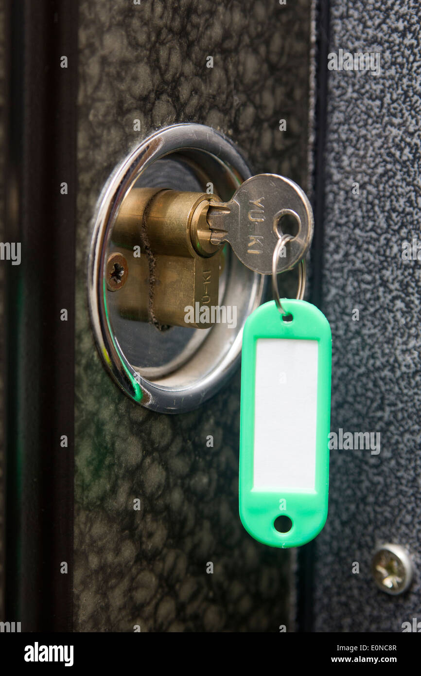 Key in lock Stock Photo - Alamy