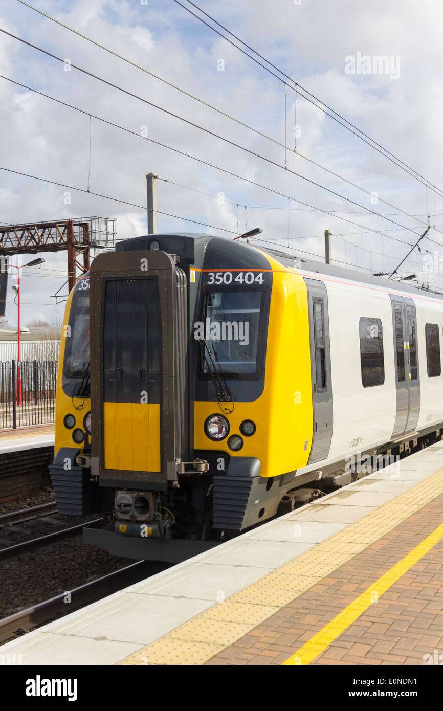 Manchester to Glasgow TransPennine Express Class 350 Desiro EMU train arriving at Wigan North Western Station. Stock Photo