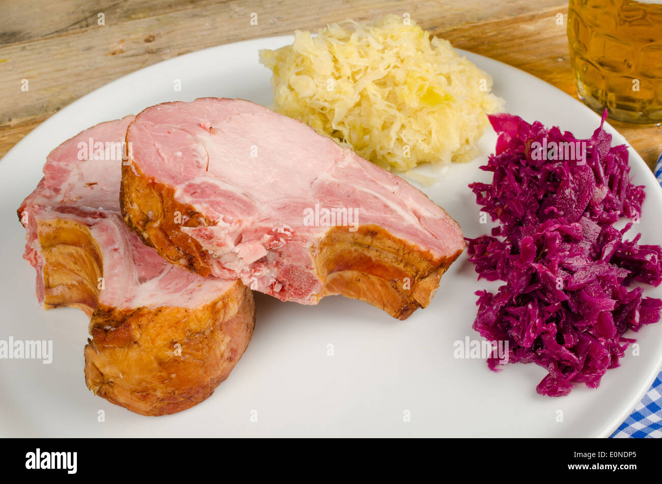 Raw kasseler, sauerkraut and red cabbage, classic German cuisine ...