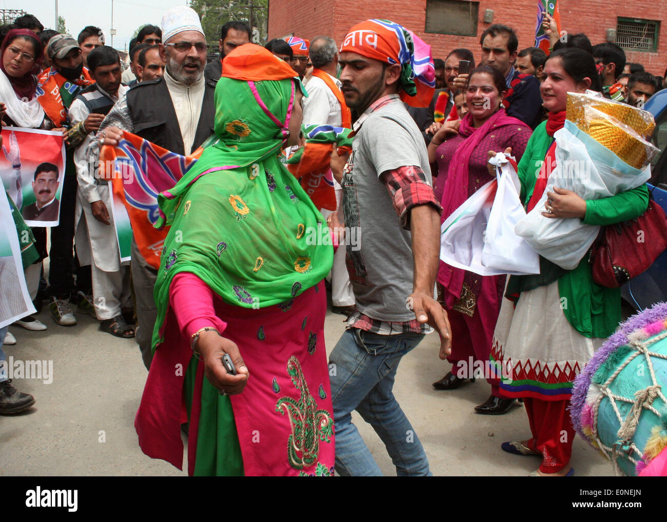 Srinagar, Indian Administered Kashmir :17 May 2014 Activists   and workers of Bhartia Janta Party (B J P ) holds  the banner of Narender Modi celebrated after party huge win yesterday in  Lok Sabah Elections  2014  Credit:  Sofi Suhail/Alamy Live News ) Stock Photo