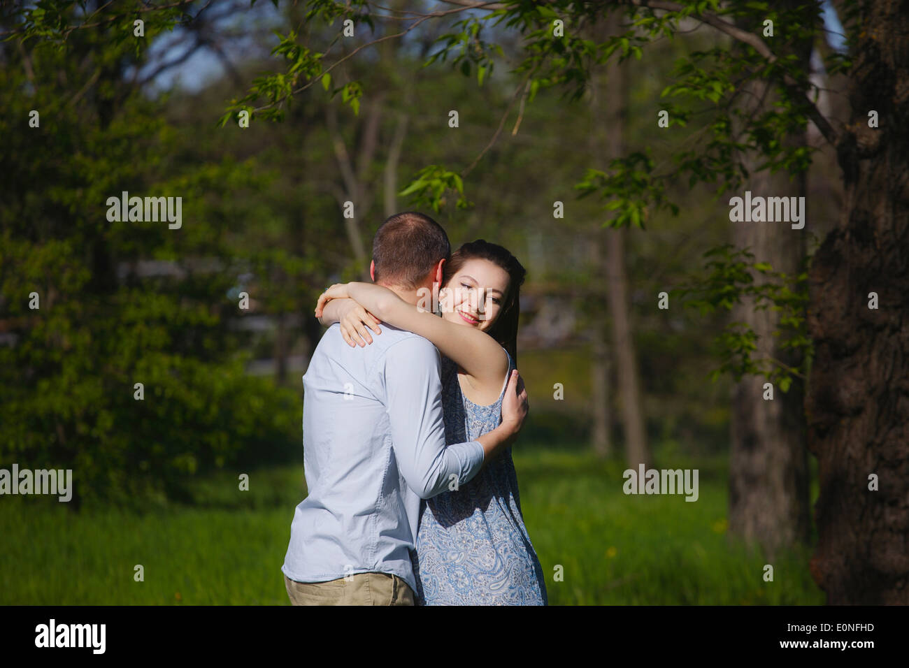 Beautiful young people hugging hi-res stock photography and images - Alamy
