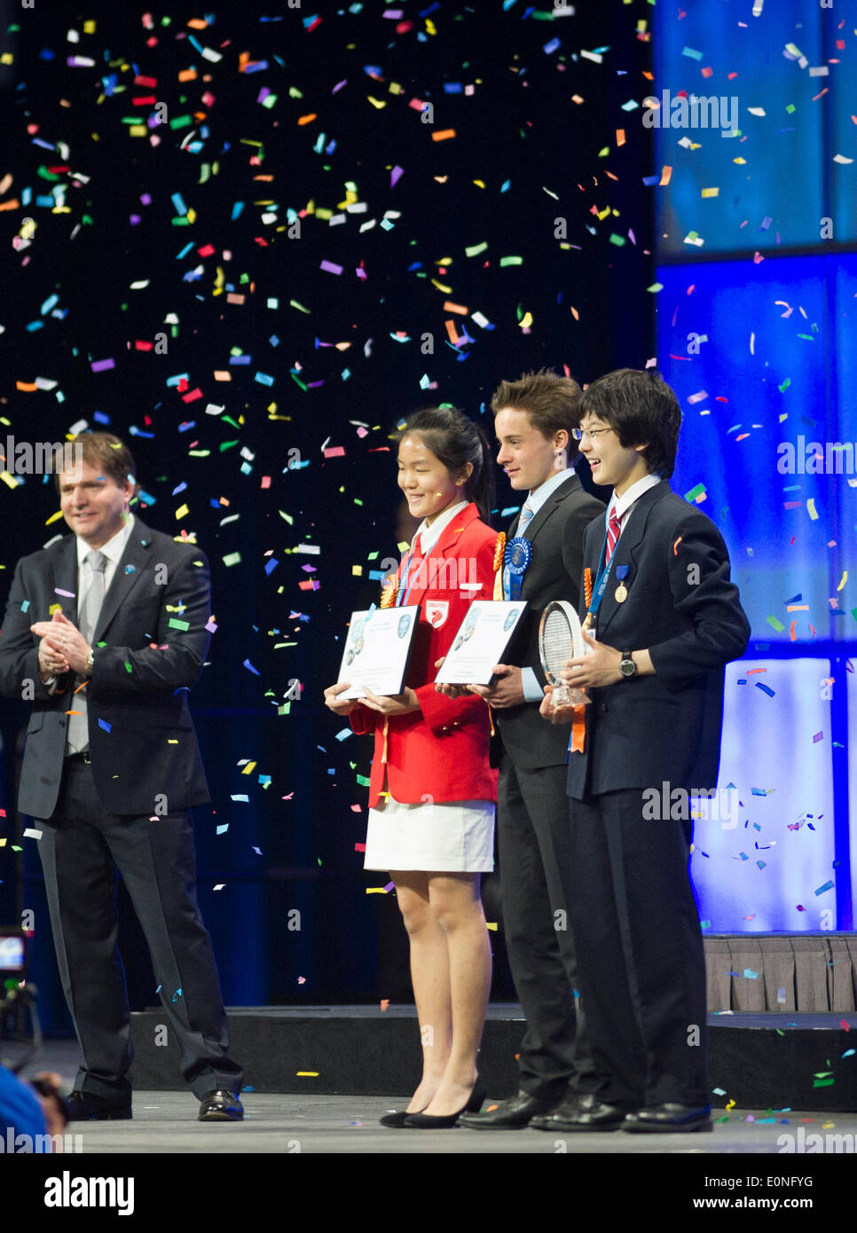 (140517) -- LOS ANGELES, May 17, 2014 (Xinhua) -- The Gordon E. Moore Award winner Nathan Han (2nd R), Intel Foundation Young Scientist Award winners Lennart Kleinwort (1st R) and Shannon Lee (3rd R) receive their awards during the award ceremony of Intel International Science and Engineering Fair (Intel ISEF) in Los Angeles, United States, May 16, 2014. Nearly 1,800 of the world's most promising young scientists, engineers and mathematicians gathered in Los Angeles from May 11 to May 16, to participate in the world's largest pre-college science competition, the 2014 Intel International Scienc Stock Photo