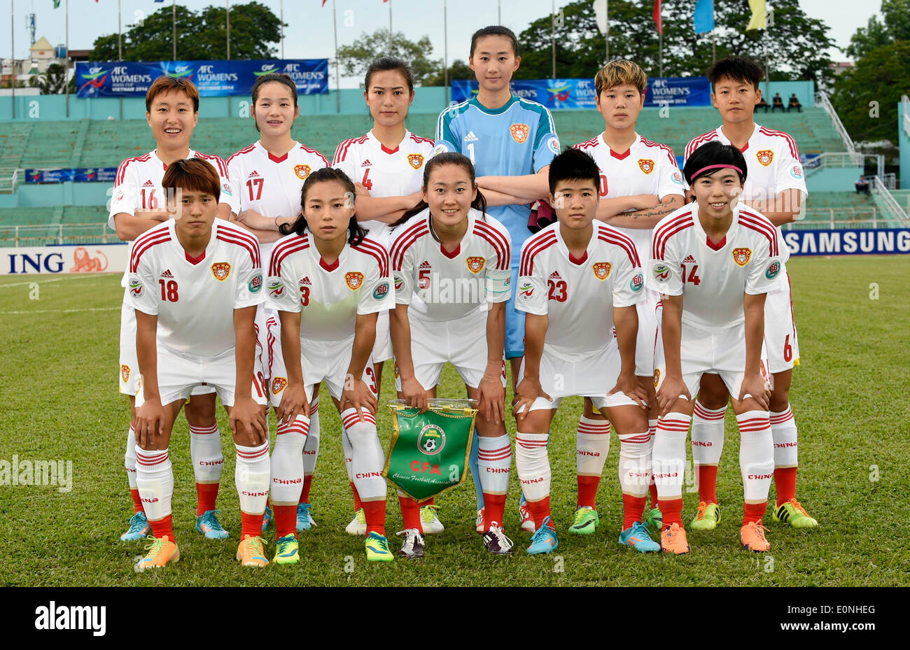 Ho Chi Minh, Vietnam. 17th May, 2014. Players of China pose for photos before the Group B match against Myanmar at the 2014 Women's AFC Cup held at Thong Nhat Stadium in Ho Chi Minh city, Vietnam, May 17, 2014. China advanced to World Cup 2015 after beating Myanmar 3-0. © He Jingjia/Xinhua/Alamy Live News Stock Photo