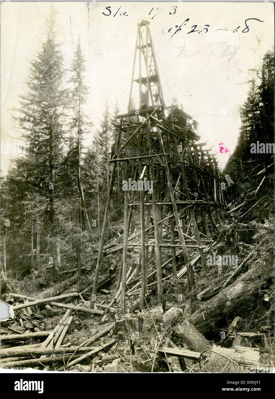 This image shows the construction of a railroad bridge, capturing a ...
