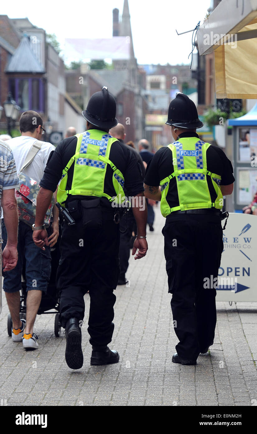 Police officers patrol the streets, Britain, UK Stock Photo