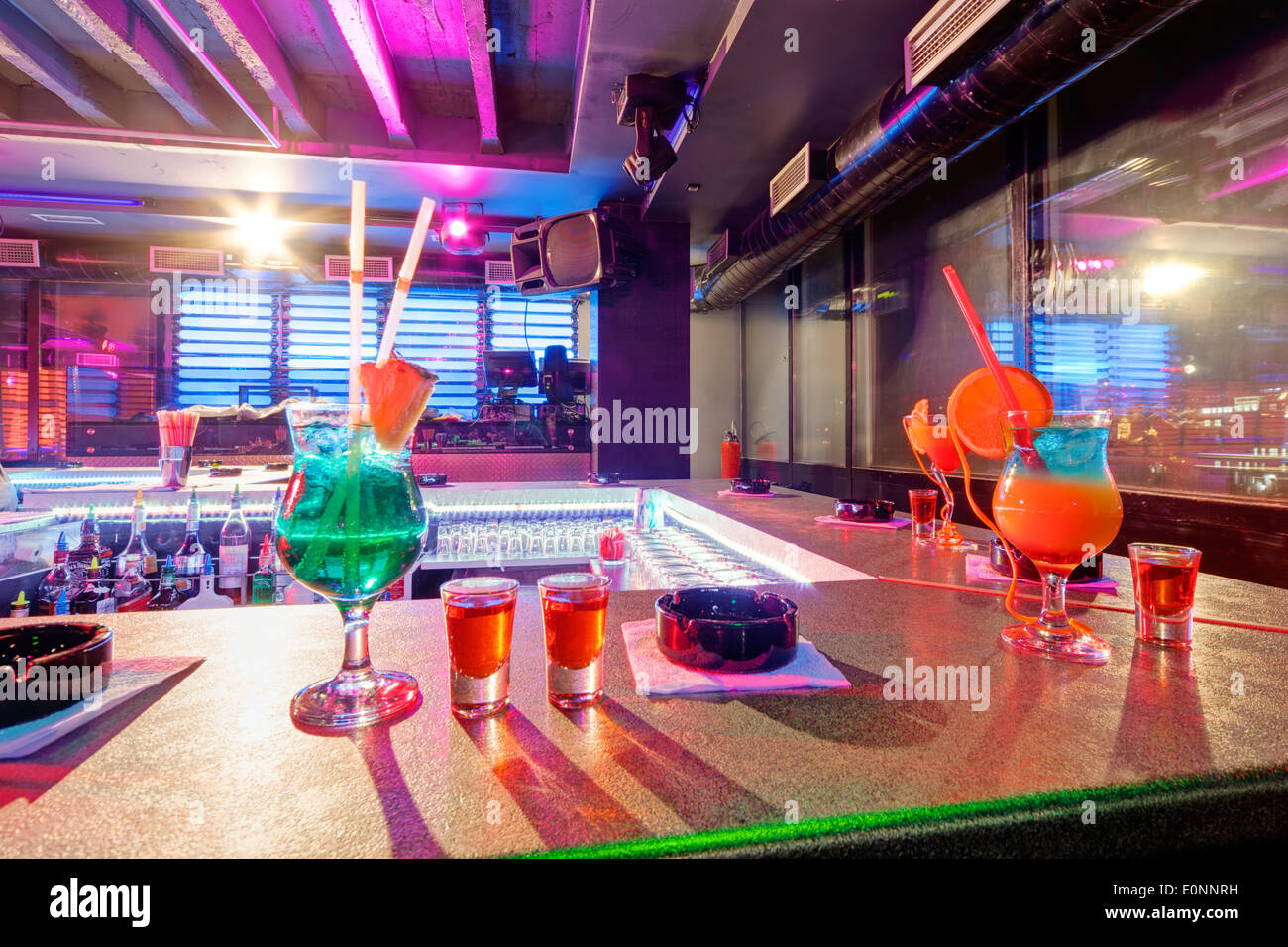 cocktail at bar in a night club with vivid colors Stock Photo Alamy