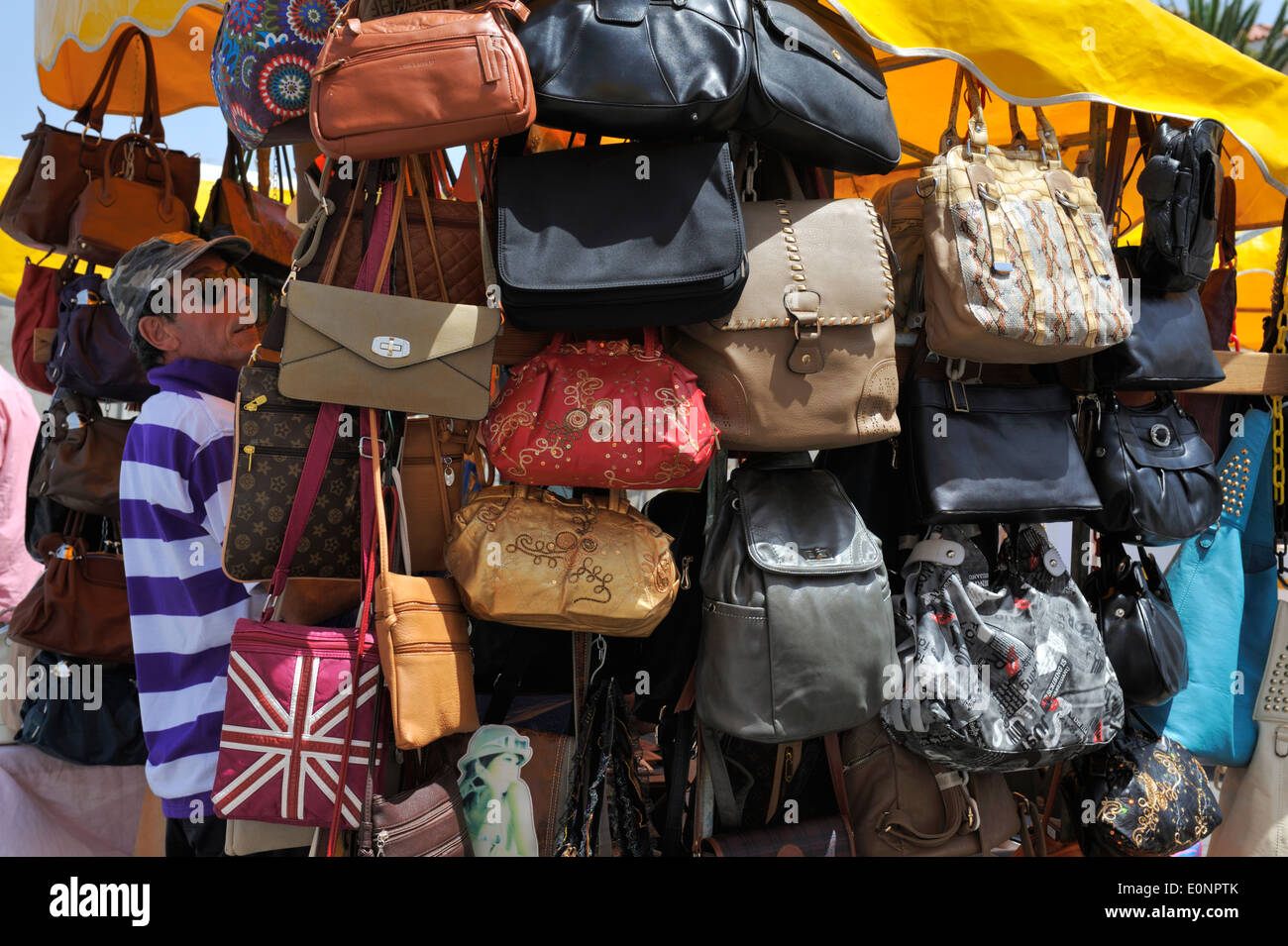Market stall selling handbags Stock Photo - Alamy