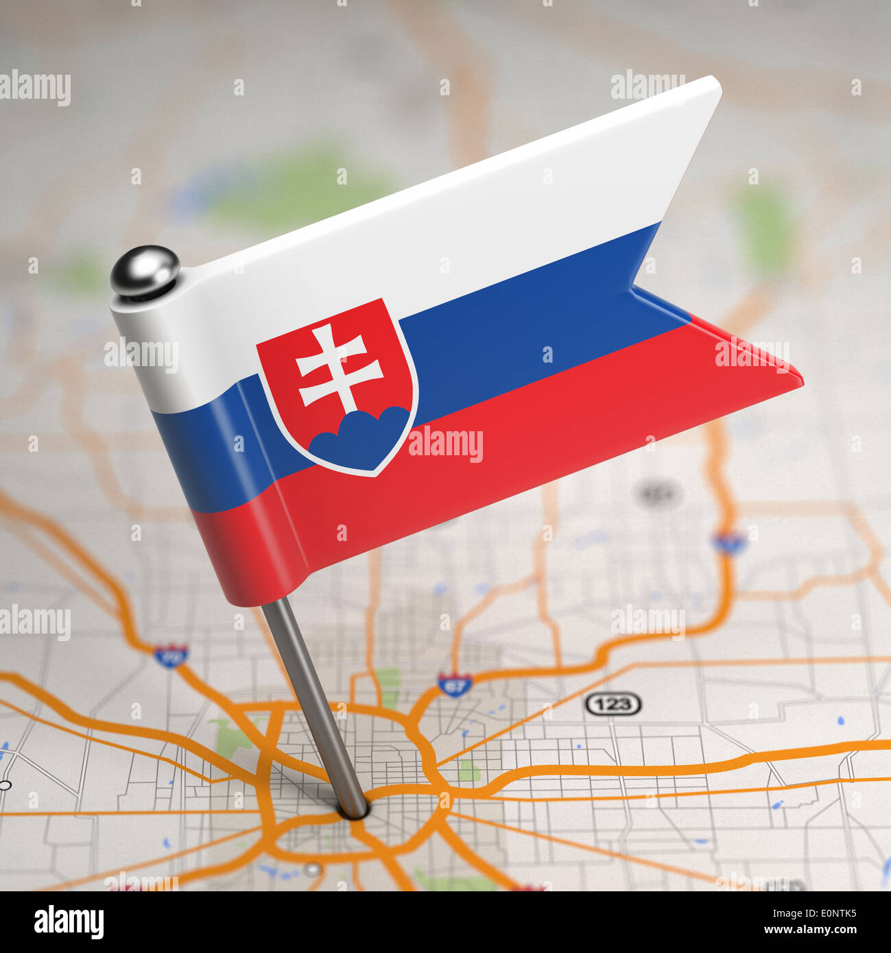 Small Flag of Slovakia on a Map Background with Selective Focus. Stock Photo