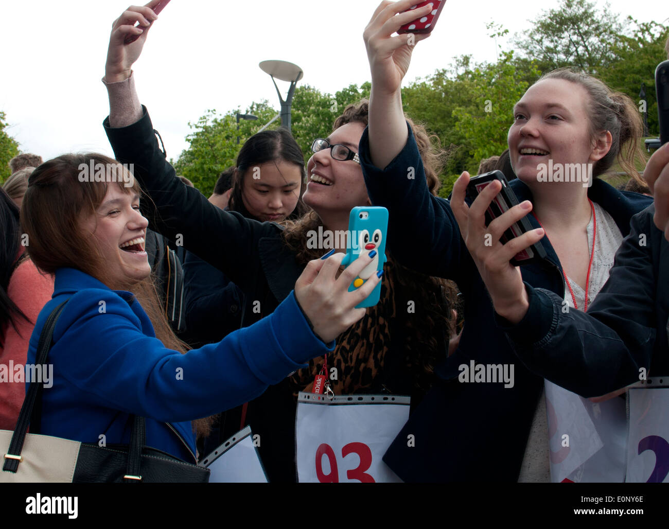 Students taking selfies Stock Photo