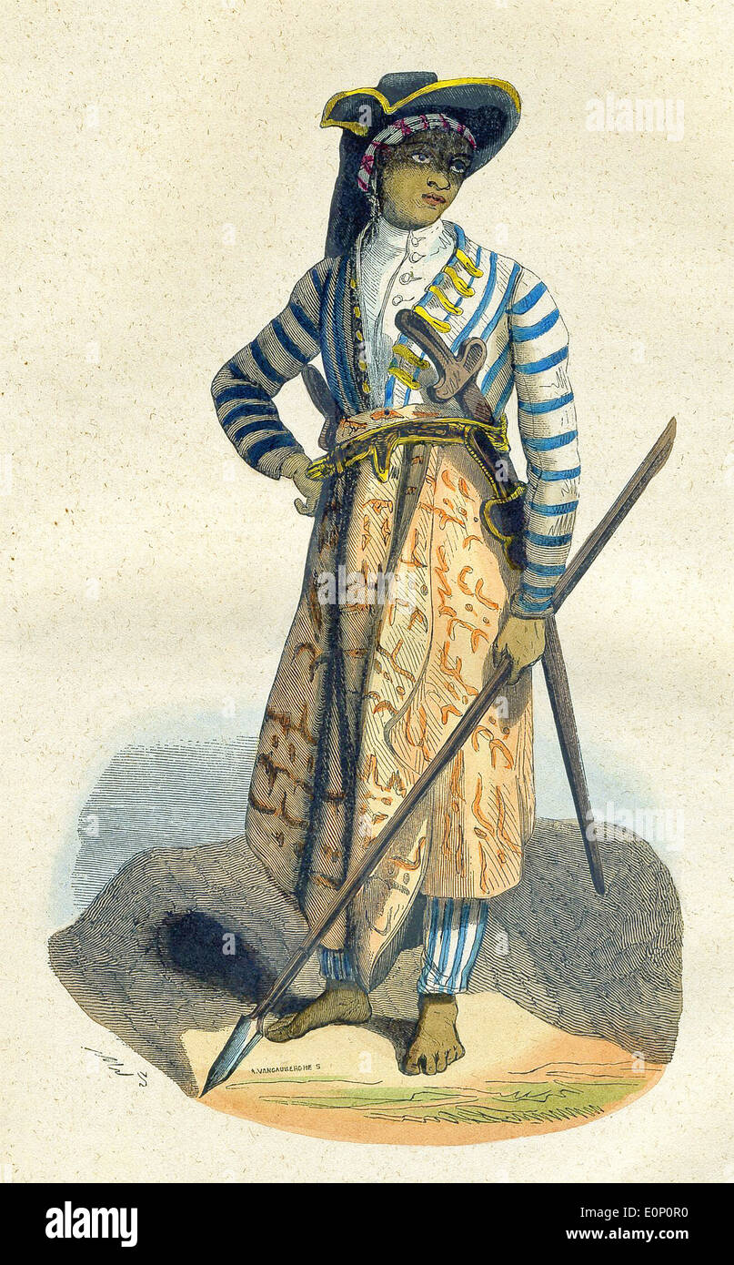 This 1843 illustration shows a Java man dressed in a outfit for war, with a spear and sword. Java is an island of Indonesia. Stock Photo