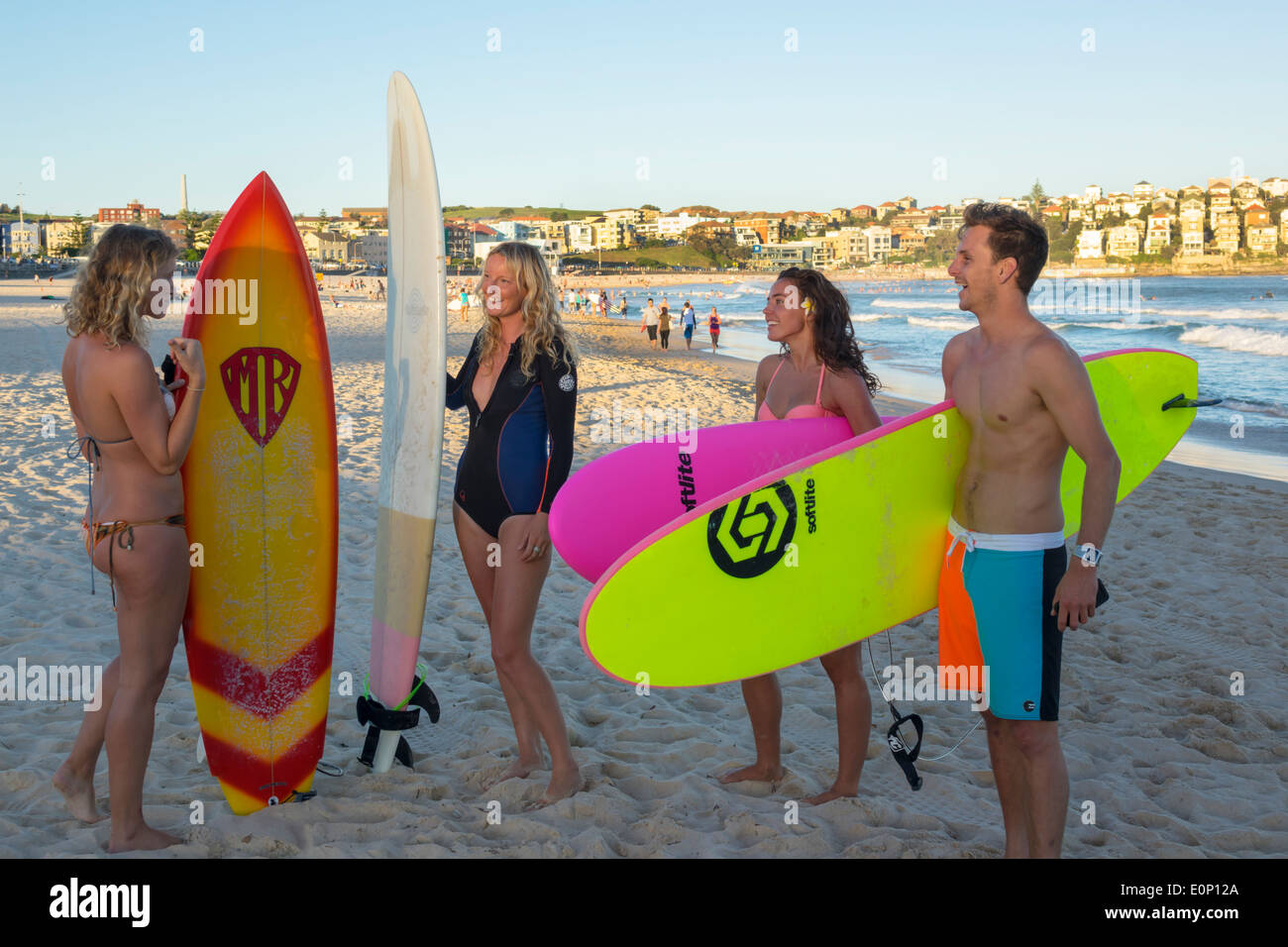 Sydney Australia,New South Wales,Bondi Beach,Pacific Ocean water,surf,waves,sand,public,North Bondi,surfers,surfer,adult adults woman women female lad Stock Photo