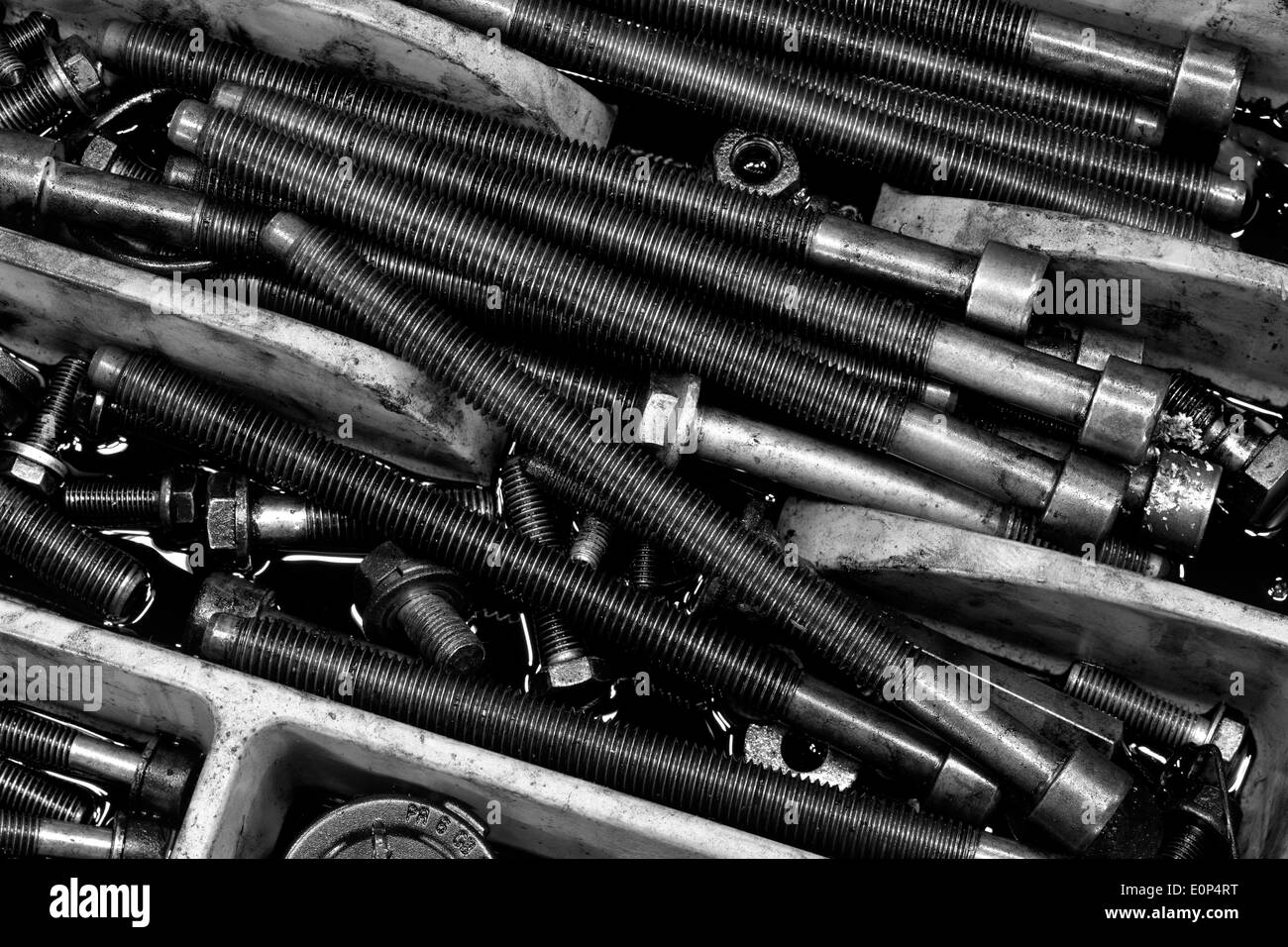 Bolts and nuts from a car engine Stock Photo