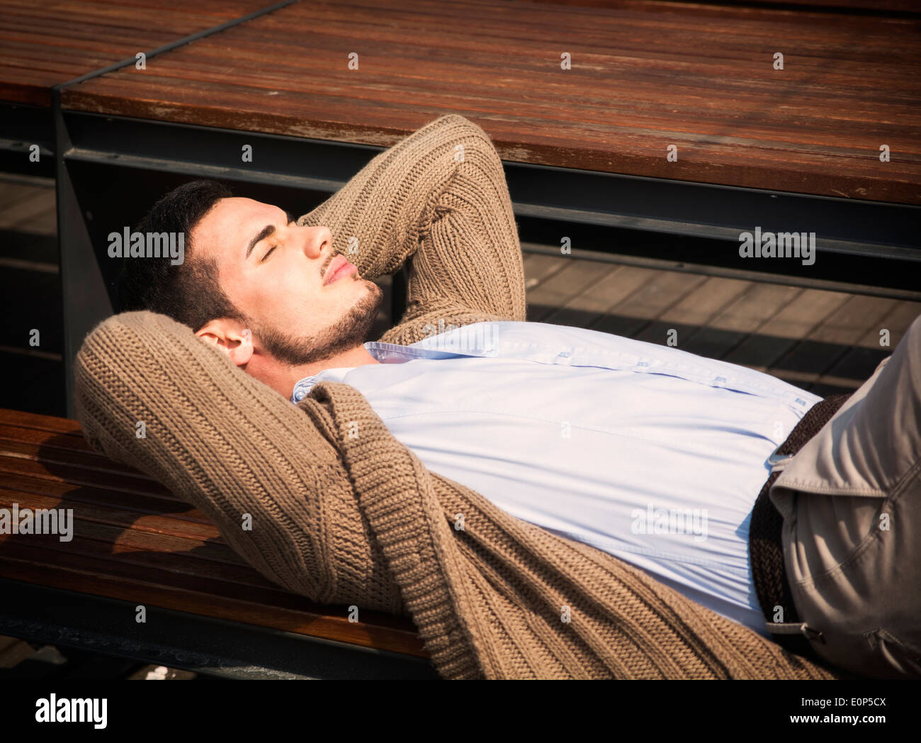 Man lying down eyes closed hi-res stock photography and images - Alamy
